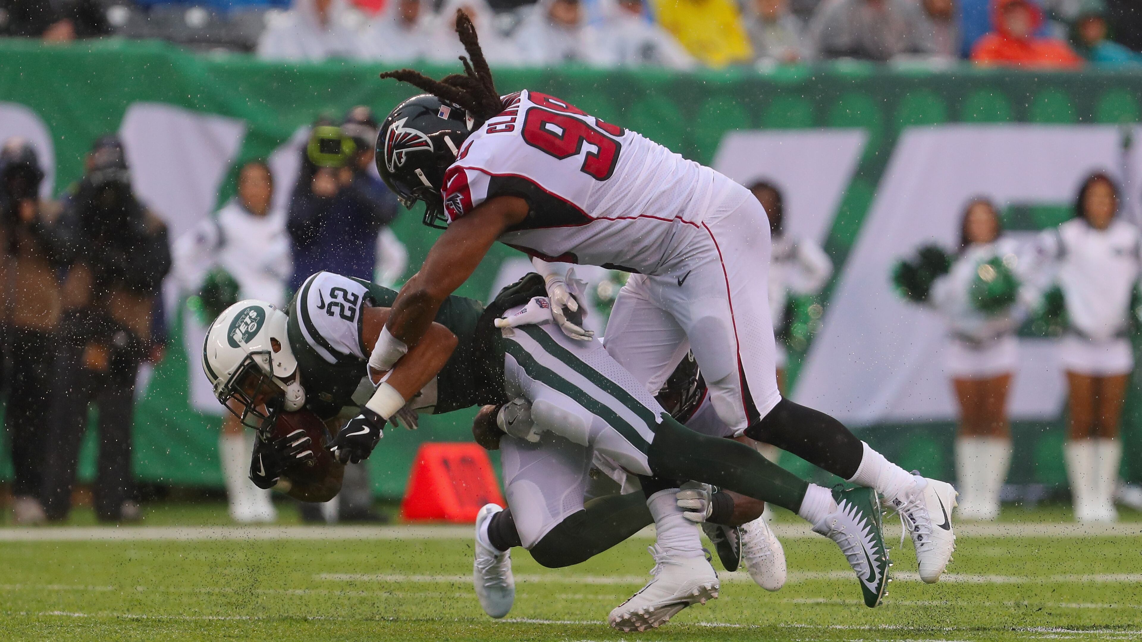 EAST RUTHERFORD, NJ - OCTOBER 29: Running back Matt Forte #22 of the New York Jets gets tackled by defensive end Adrian Clayborn #99 of the Atlanta Falcons during the first half of the game at MetLife Stadium on October 29, 2017 in East Rutherford, New Jersey. (Photo by Ed Mulholland/Getty Images)