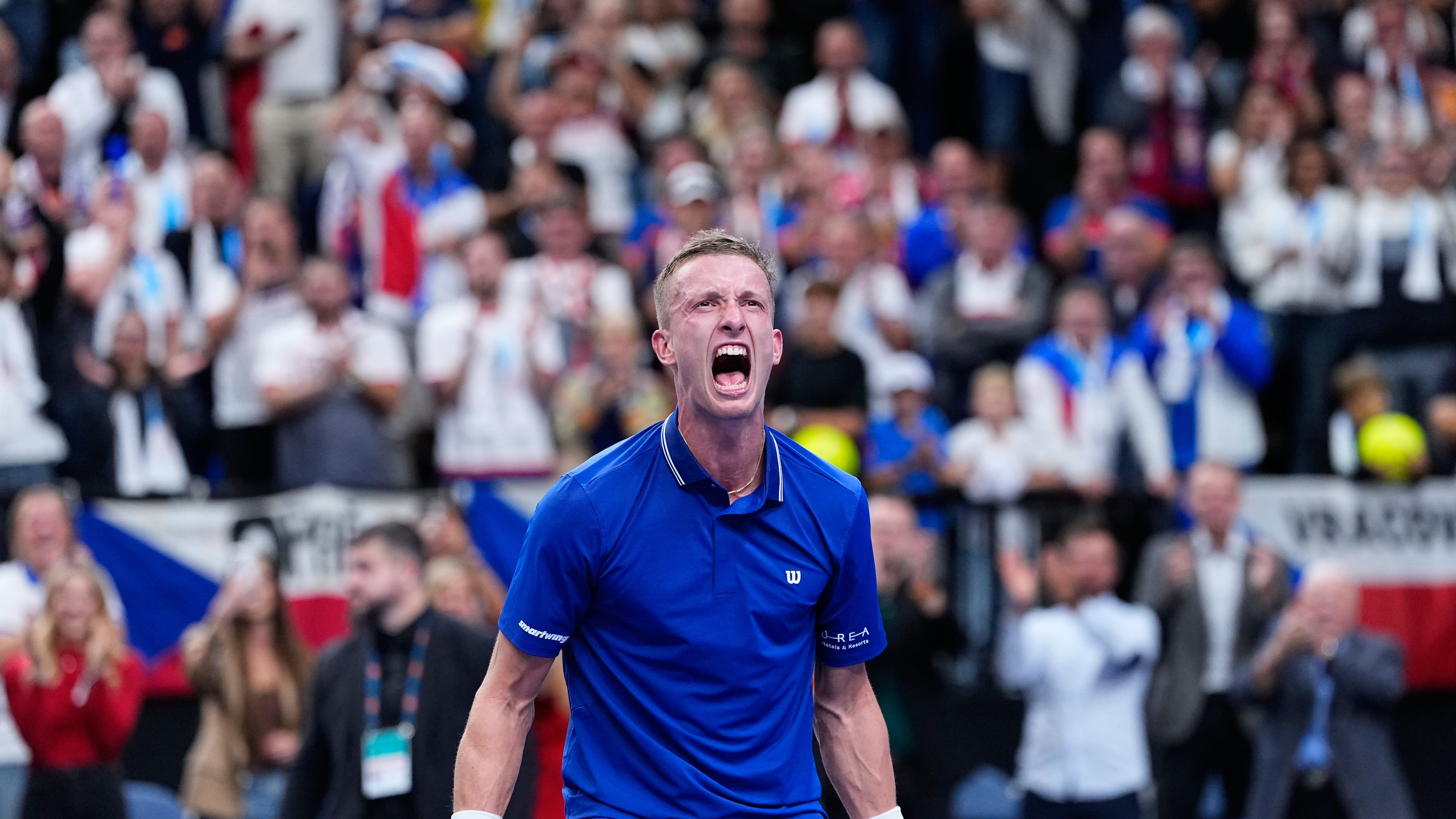Czechia's Jiri Lehecka celebrates after winning the decisive point against United States' Learner Tien during the Davis Cup second round qualifier match between the Czech Republic and the United States, in Prague, Saturday, Sept. 19, 2026. (AP Photo/Petr David Josek)