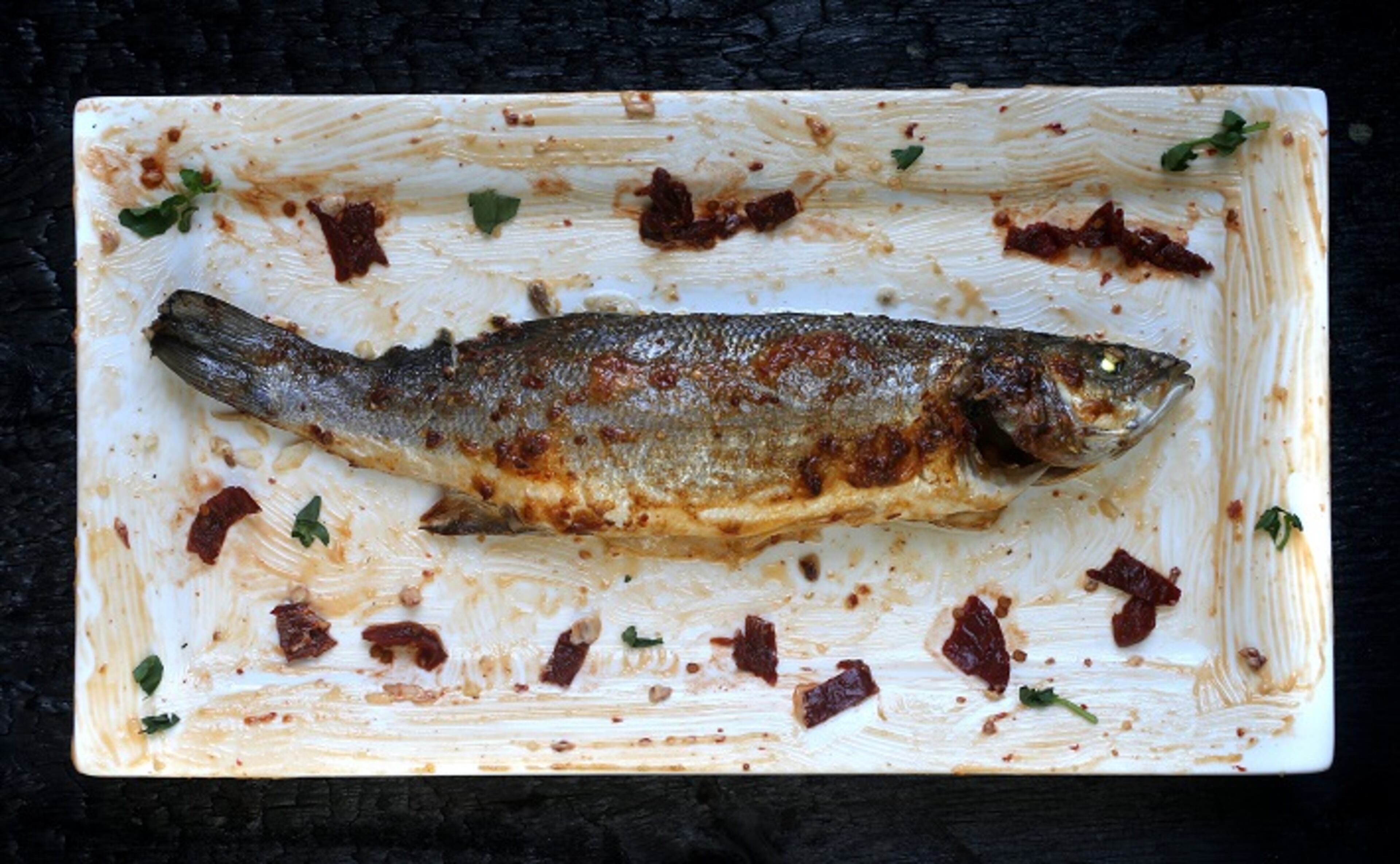 Whole Baked Fish, Estero on Wednesday, Jan. 31, 2018. The fish is Branzino. (Laurie Skrivan/St. Louis Post-Dispatch/TNS)