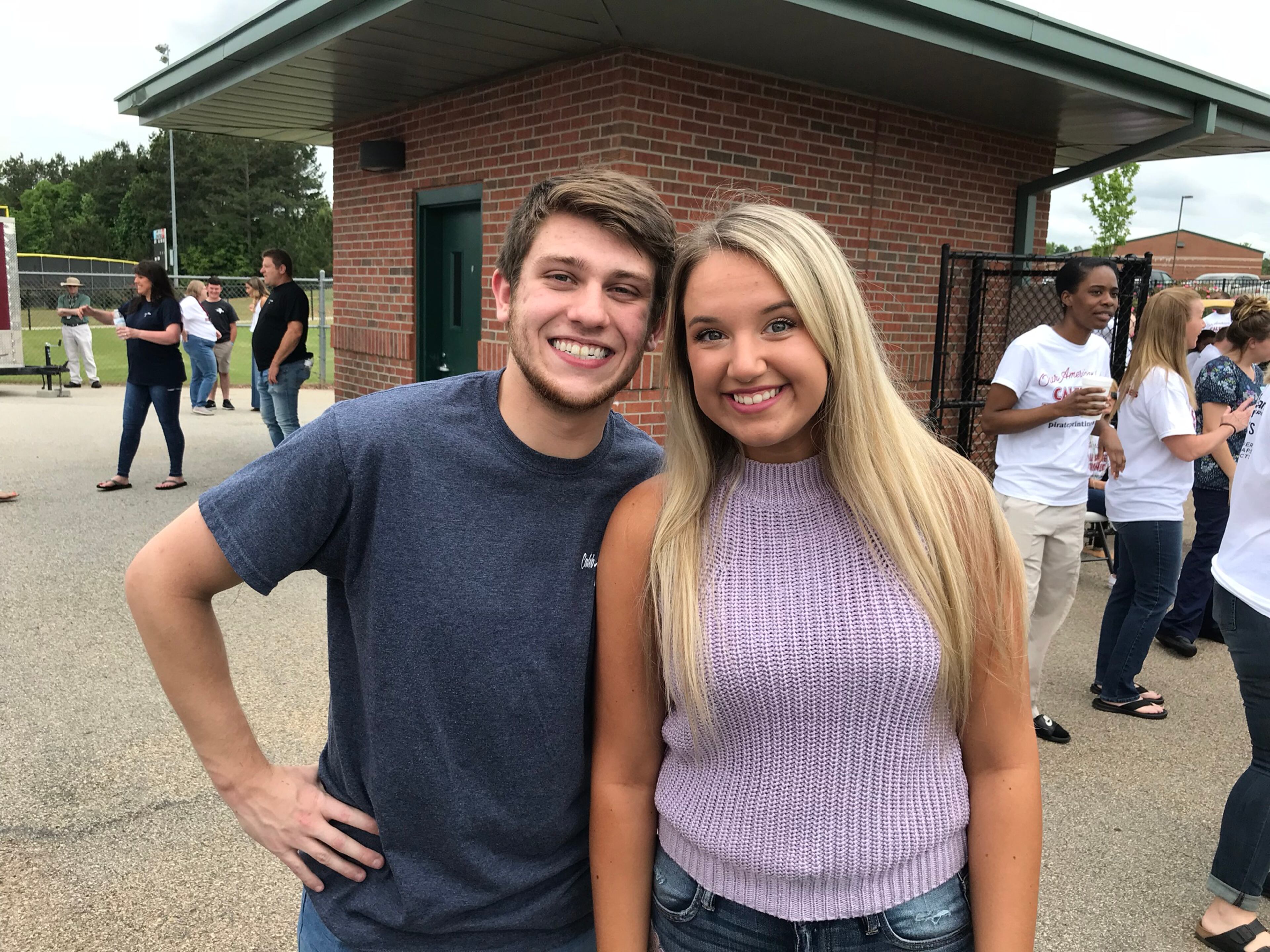 Harley Fuller and Chloe Strickland, two close friends of Caleb Lee Hutchinson, came back to their high school to cheer their friend on at the pep rally. CREDIT: Rodney Ho/rho@ajc.com