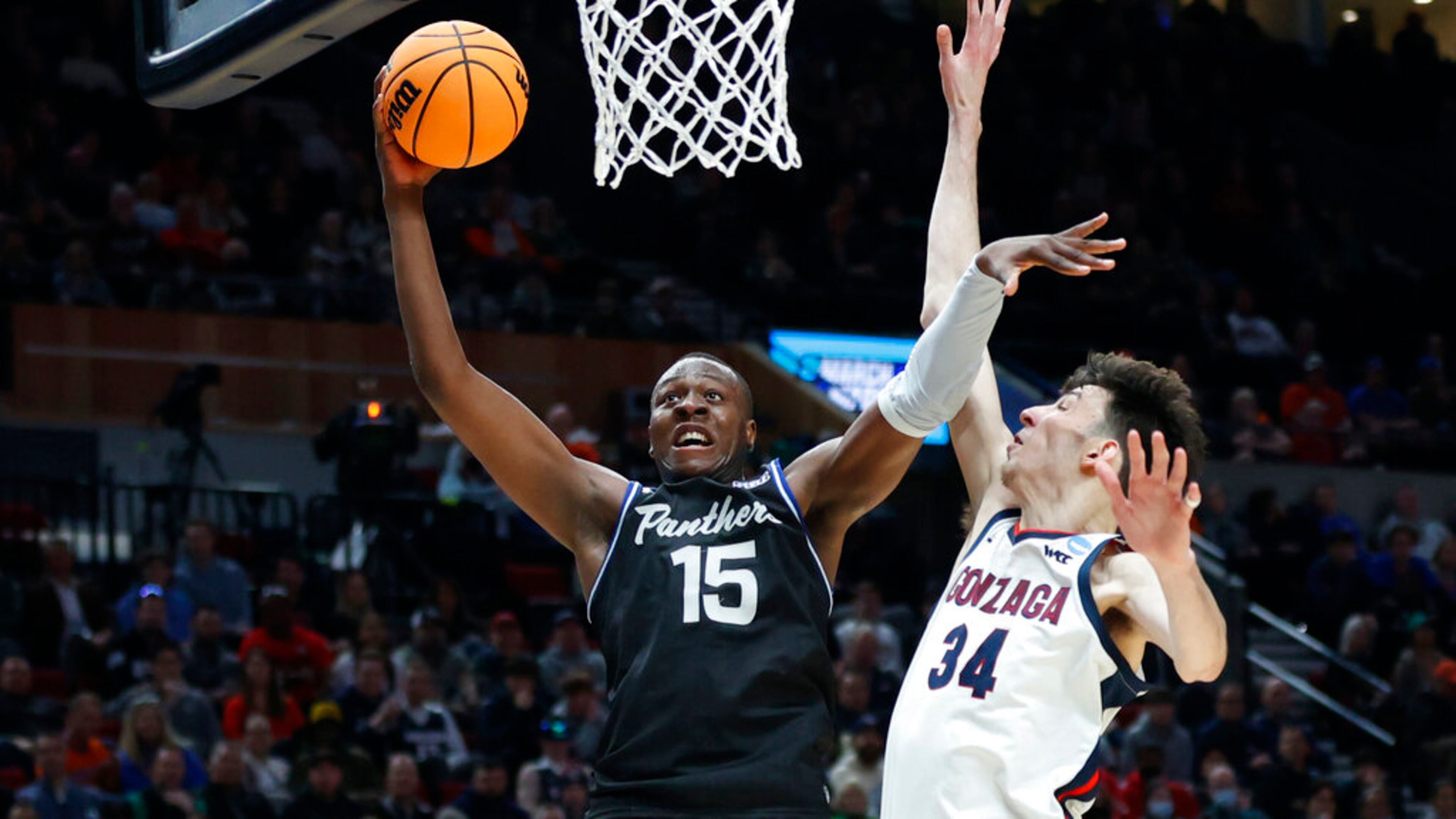 Georgia State forward Ja'Heim Hudson (15) eyes the basket in front of Gonzaga center Chet Holmgren (34) during the first half of a first round NCAA college basketball tournament game, Thursday, March 17, 2022, in Portland, Ore. Hudson is one of the talented returns that the Panthers can build on for nexst season. (AP Photo/Craig Mitchelldyer)