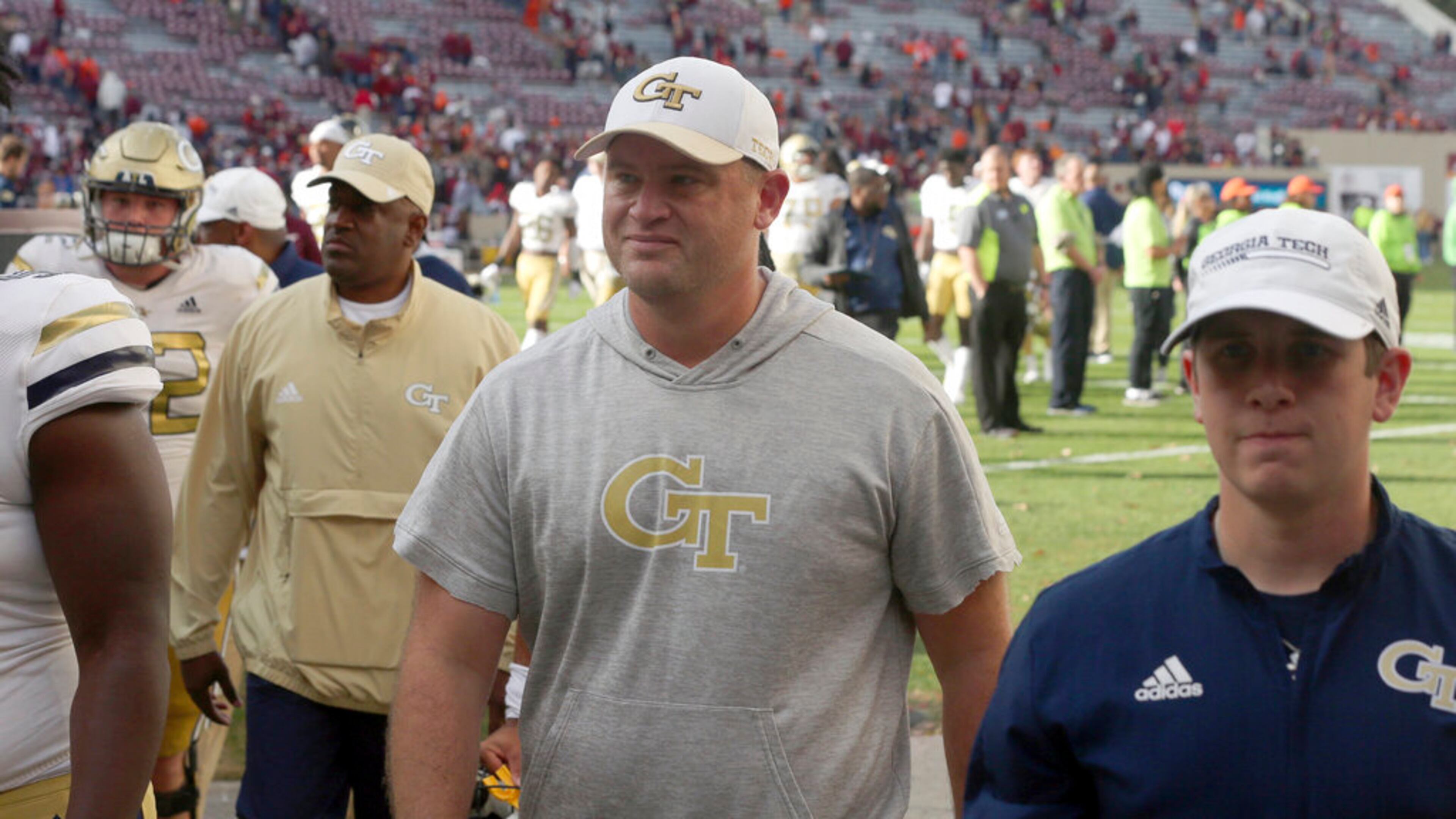 Georgia Tech interim coach Brent Key walks off the field after an NCAA college football game against Virginia Tech, Saturday, Nov. 5 2022, in Blacksburg, Va. (Matt Gentry/The Roanoke Times via AP)