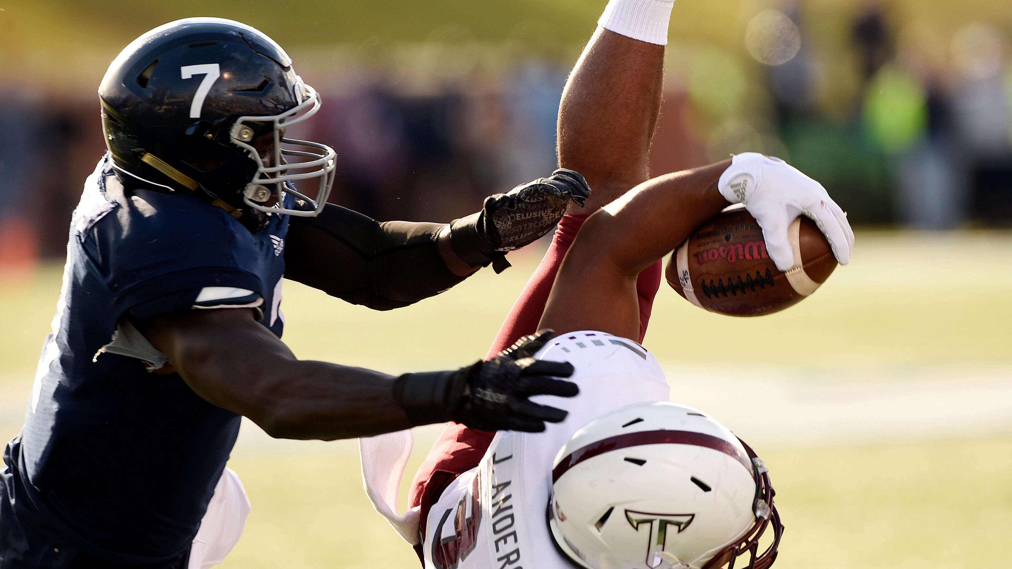 STATESBORO, GA - DECEMBER 3: Linebacker Ukeme Eligwe #7 of the Georgia Southern Eagles chases down running back Josh Anderson #33 of the Troy Trojans on December 3, 2016 at Paulson Stadium in Statesboro, Georgia. (Photo by Todd Bennett/Getty Images)