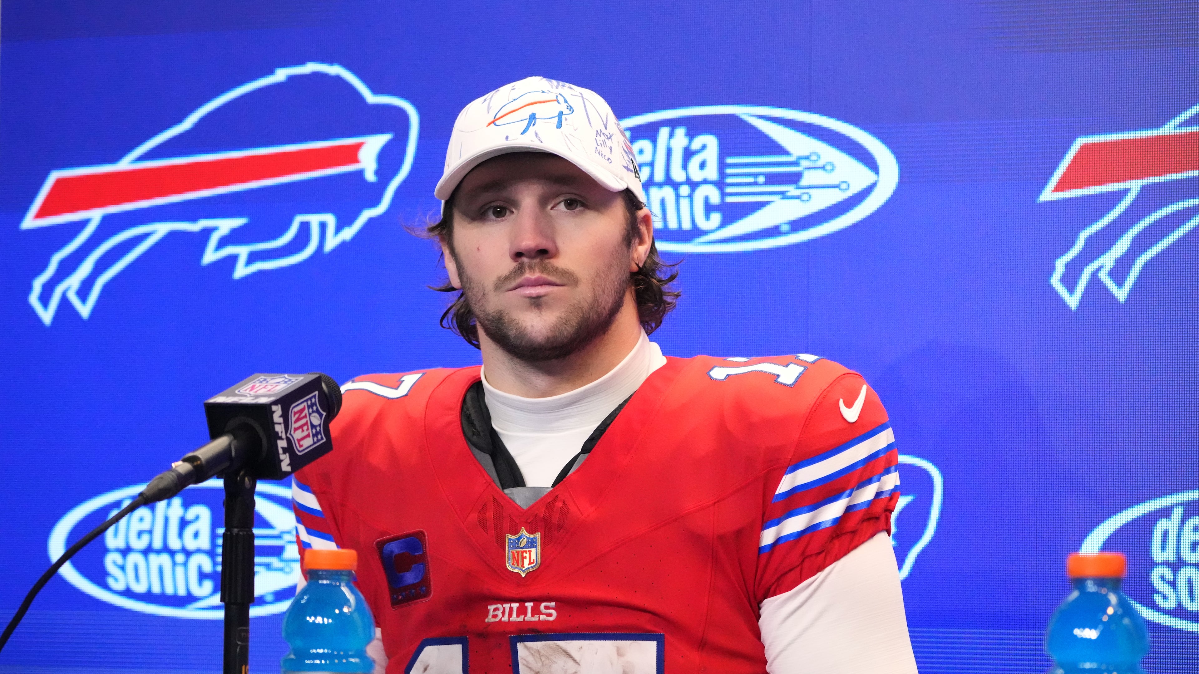 Buffalo Bills' Josh Allen pauses during a news conference after an NFL football game against the Philadelphia Eagles, Sunday, Dec. 28, 2025, in Buffalo, N.Y. (AP Photo/Gene J. Puskar)