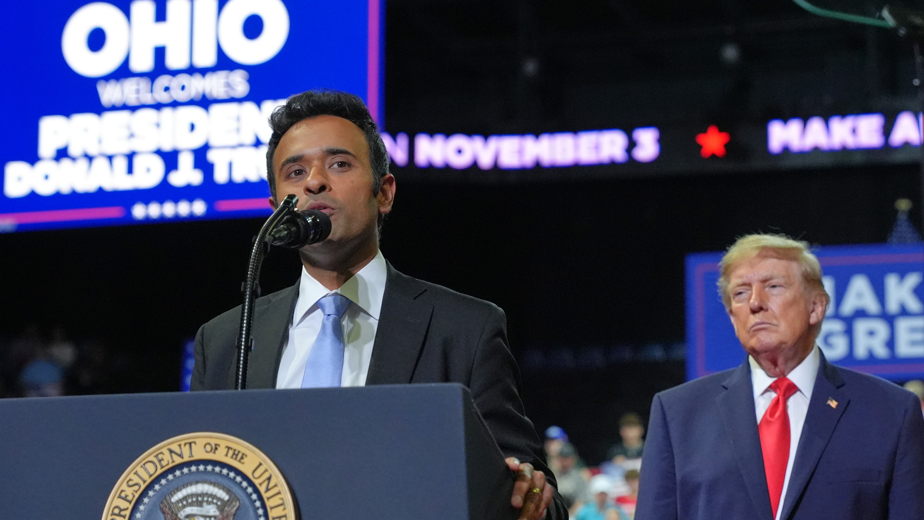 President Donald Trump listens as gubernatorial candidate Vivek Ramaswamy speaks at a campaign rally at the Covelli Centre, in Youngstown, Ohio, Monday, Oct. 12, 2026. (AP Photo/Jacquelyn Martin)