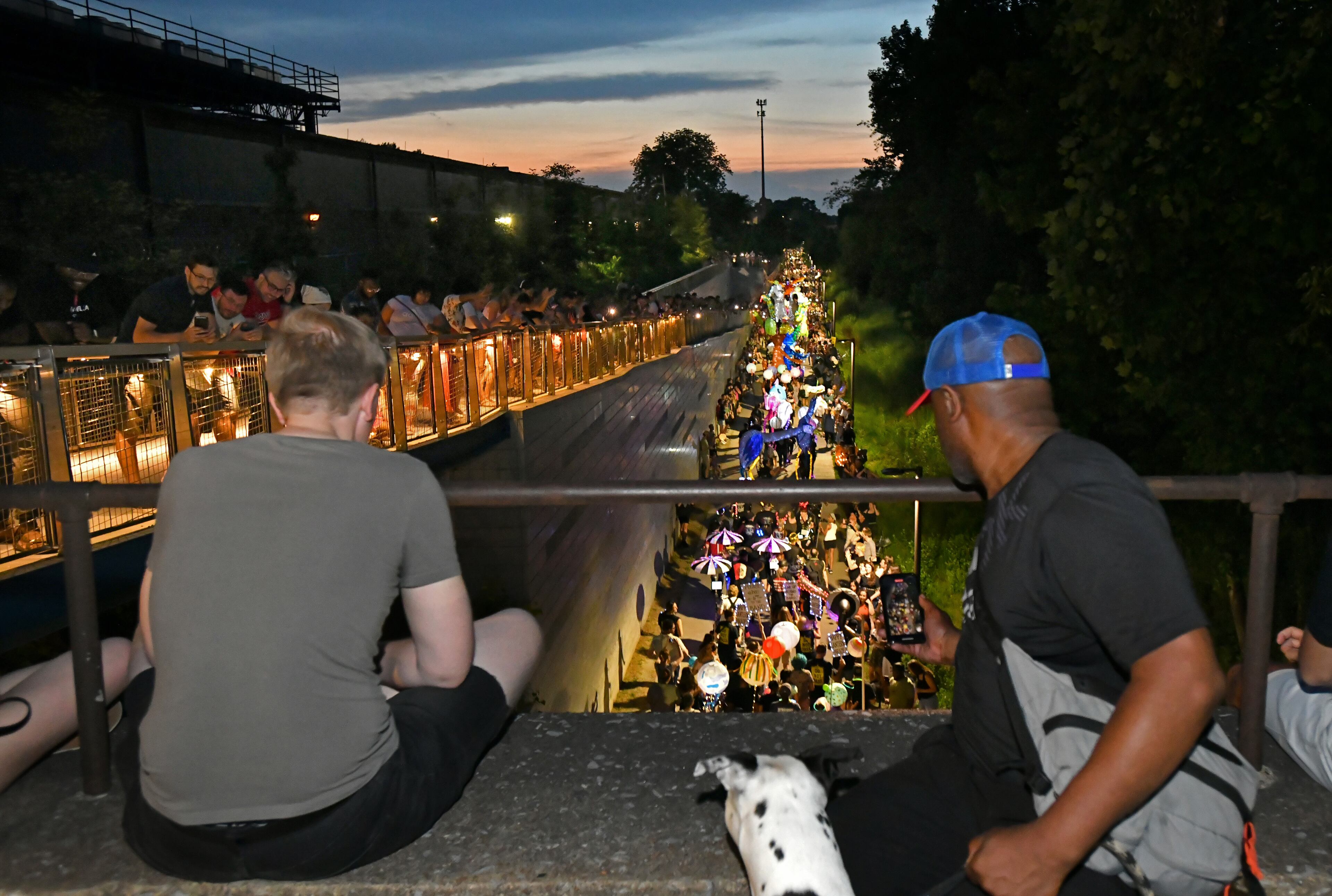 After a two-year hiatus because of the pandemic, thousands of participants and onlookers enjoy the Atlanta Beltline Lantern Parade on Saturday, May 21, 2022. The nighttime parade began in 2010, and has grown into an event that in recent years brought more than 70,000 people to the Beltline for the procession of illuminated paper creations of all shapes and types. (Hyosub Shin / Hyosub.Shin@ajc.com)