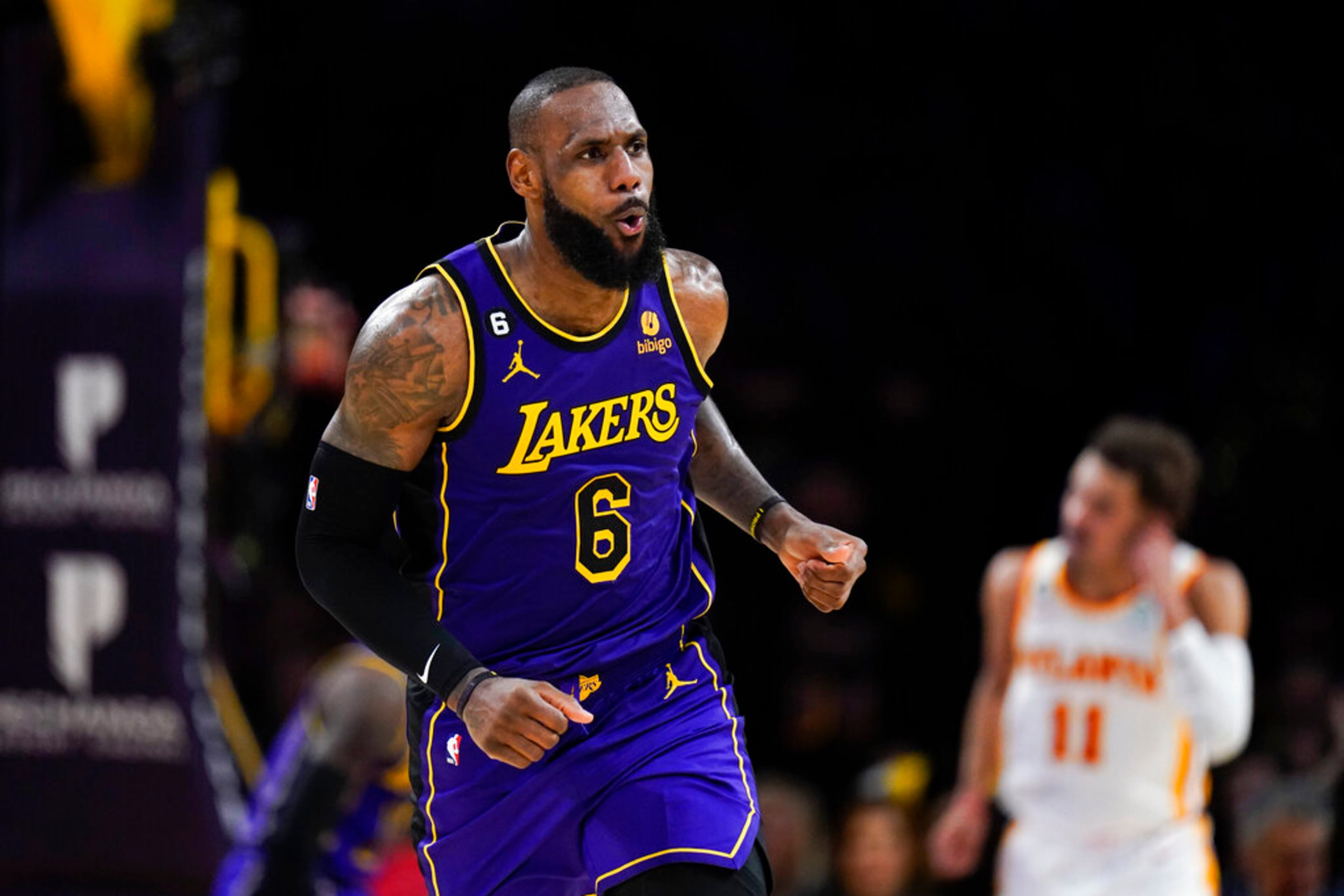 Los Angeles Lakers' LeBron James (6) reacts after making a basket against the Atlanta Hawks during the second half of an NBA basketball game Friday, Jan. 6, 2023, in Los Angeles. The Lakers won 130-114. (AP Photo/Jae C. Hong)