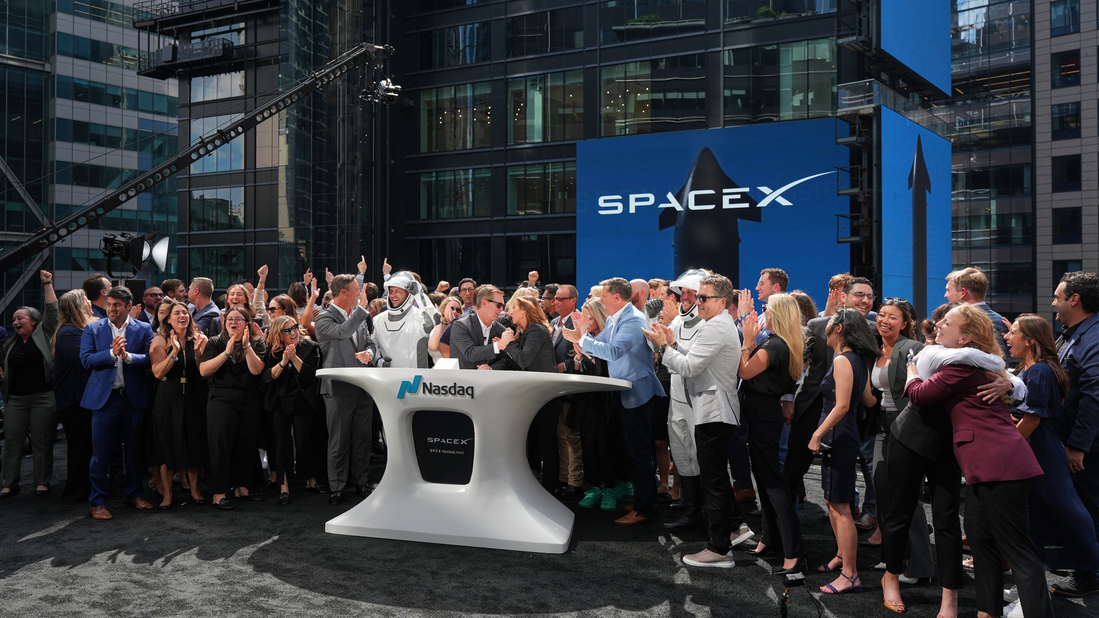SpaceX employees celebrate during a closing bell ceremony for the IPO of SpaceX at the Nasdaq MarketSite in New York, Friday, June 12, 2026, in New York. (AP Photo/Frank Franklin II)