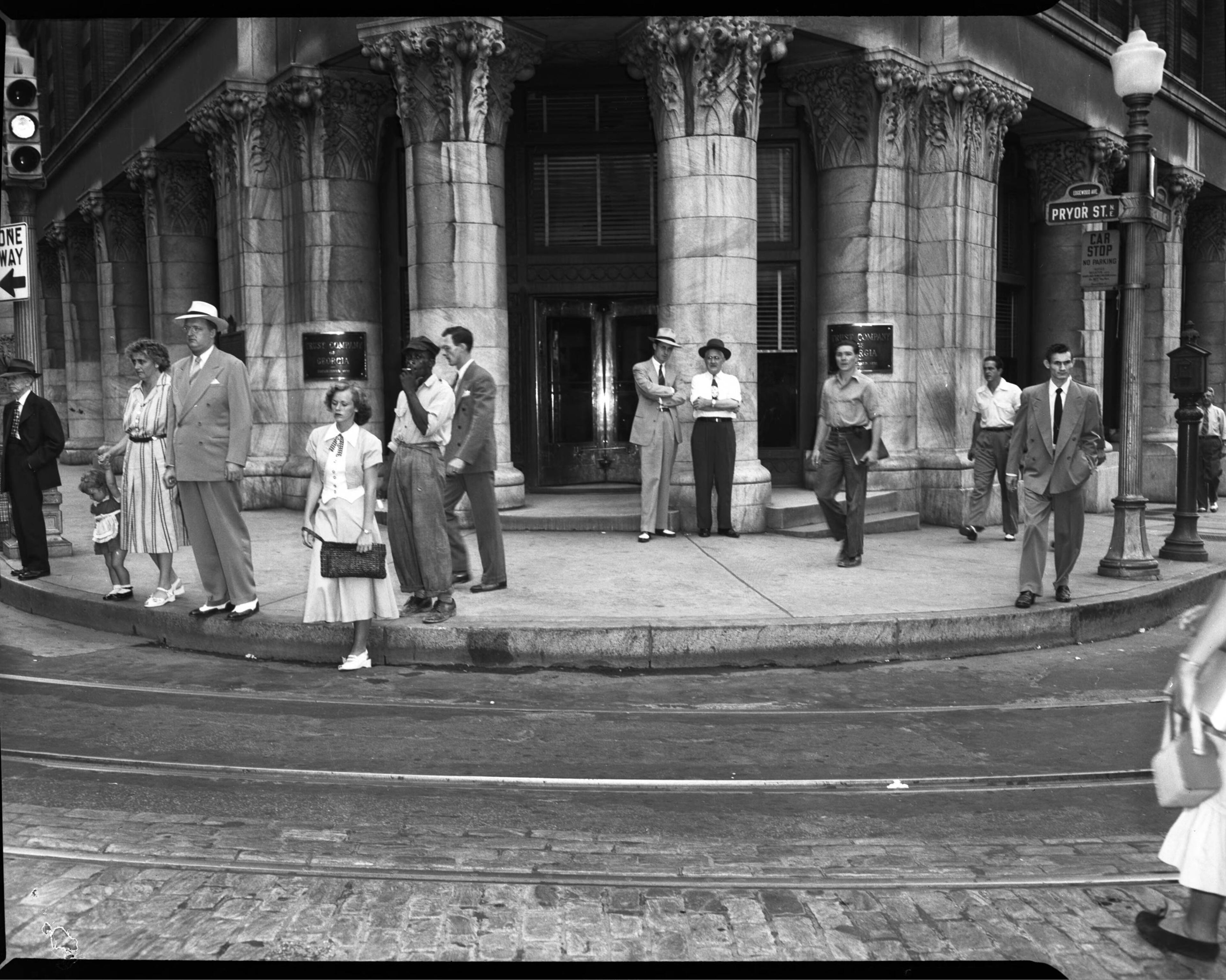 The scene in front of the Equitable Building at the corner of Edgewood Avenue and Pryor Street on an early summer day in June 1949. LBGPNS11-047a, Lane Brothers Commercial Photographers Photographic Collection, 1920-1976. Photographic Collection, Special Collections and Archives, Georgia State University Library.