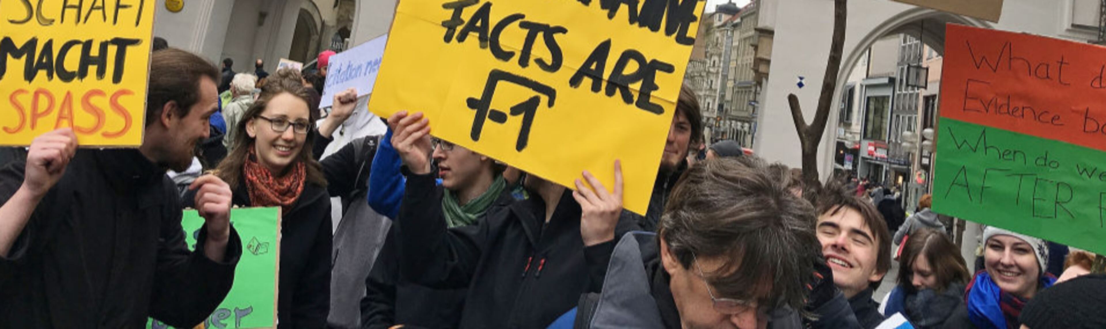 MUNICH, GERMANY - APRIL 22: People march in support of scientific research during the "March for Science" demonstration on April 22, 2017 in Munich, Germany. People all over the world are participating in "March for Science" demonstrations to protest against the statements and polices of the administration of U.S. President Donald Trump that deride scientific research deemed inconvenient for Trump's political agenda. (Photo by Sandra Montanez/Getty Images)