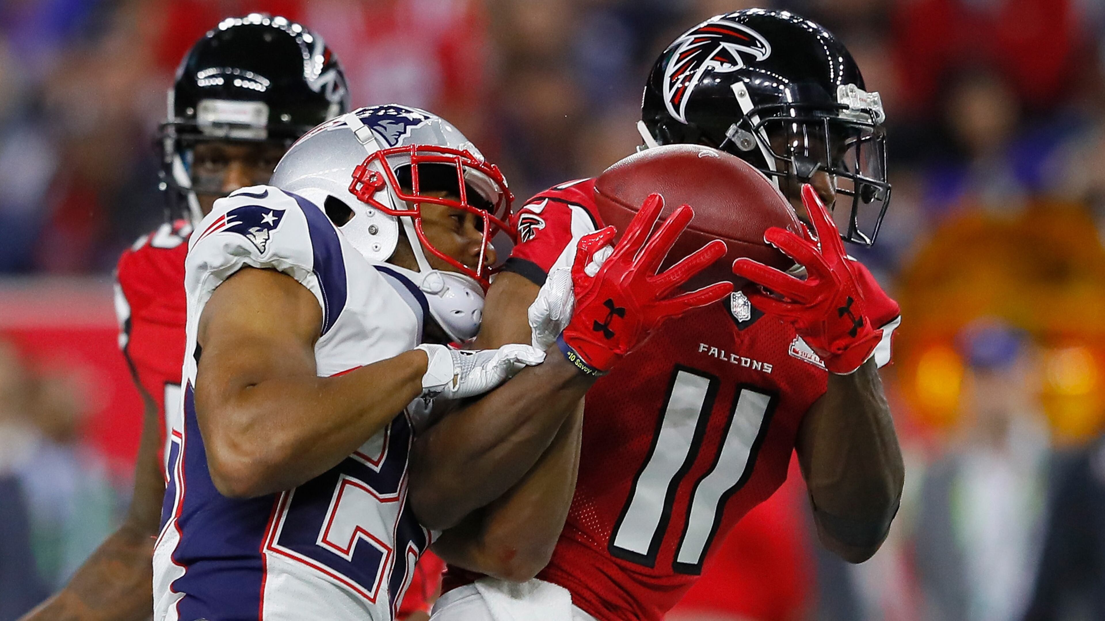 Falcons wide receiver Julio Jones makes a catch against Logan Ryan of the New England Patriots in the fourth quarter during the Super Bowl Sunday, Feb. 5, 2017, at NRG Stadium in Houston.