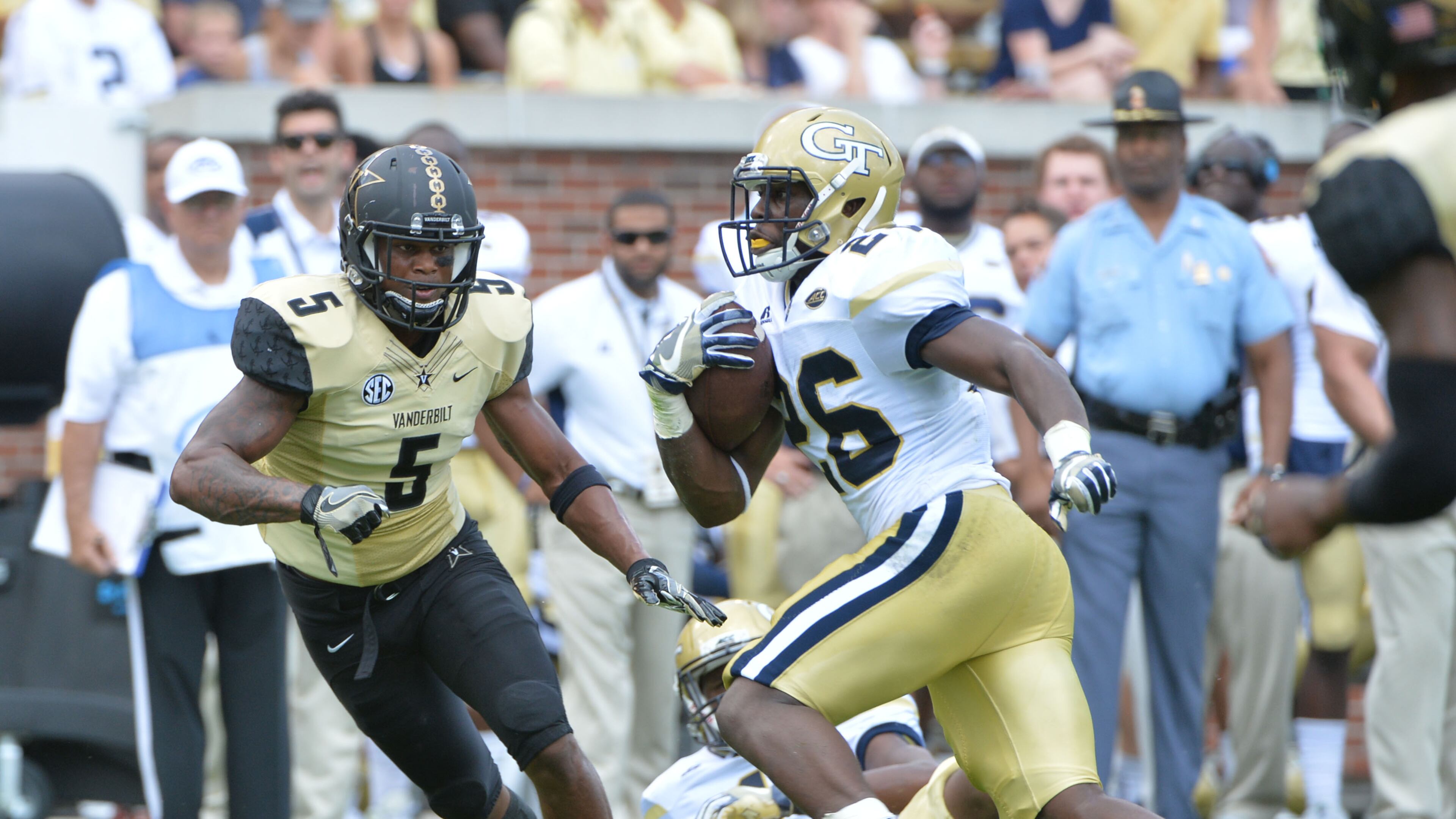 Georgia Tech Yellow Jackets running back Dedrick Mills (26) runs for a touchdown against the Vanderbilt Commodores in the first half at Bobby Dodd Stadium on Saturday, September 17, 2016. HYOSUB SHIN / HSHIN@AJC.COM