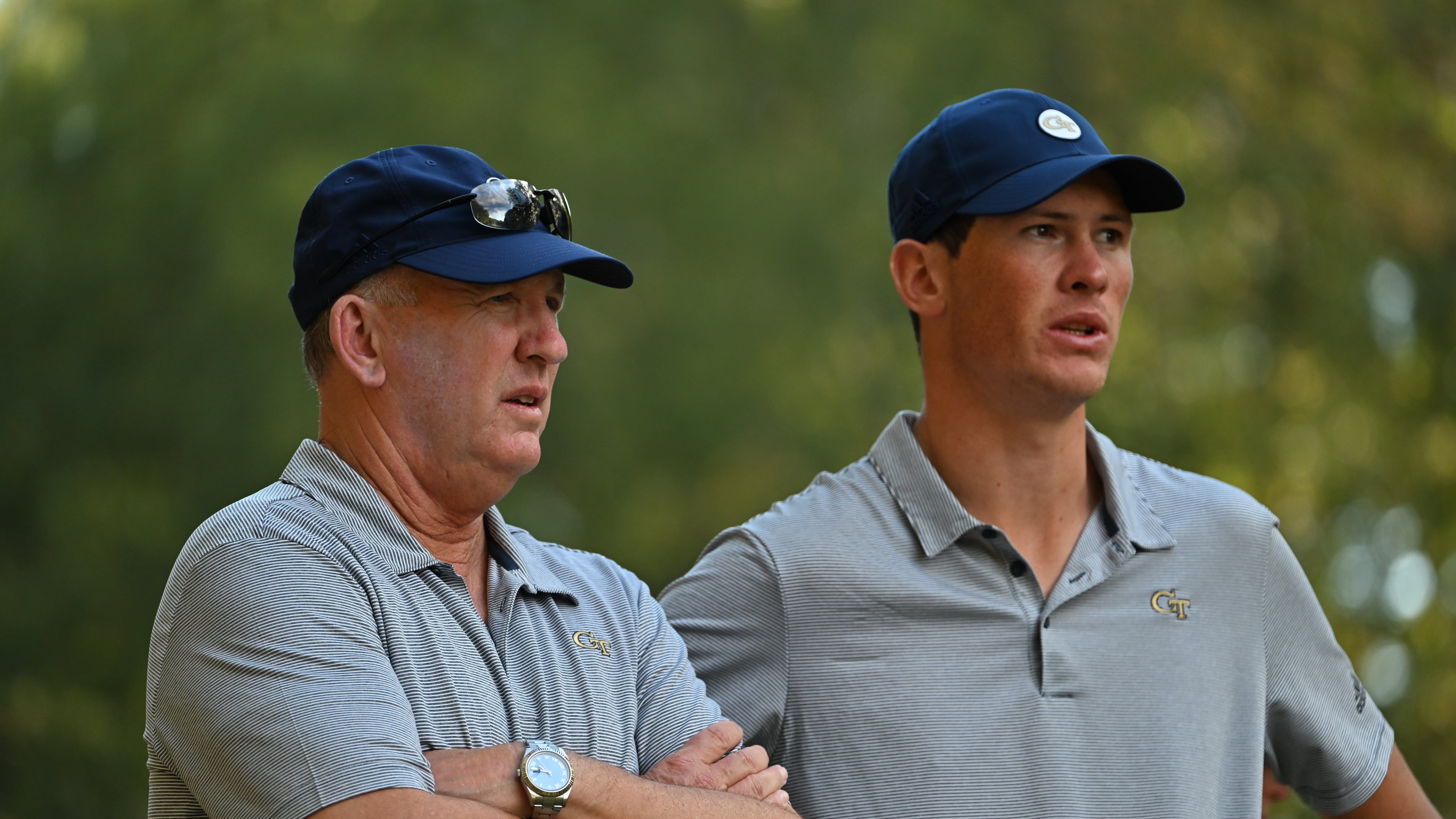 Georgia Tech golf coach Bruce Heppler (left) confers with team member Christo Lamprecht at the Golf Club of Georgia Collegiate tournament at Golf Club of Georgia in Alpharetta Oct. 22, 2022. (Danny Karnik/Georgia Tech Athletics)