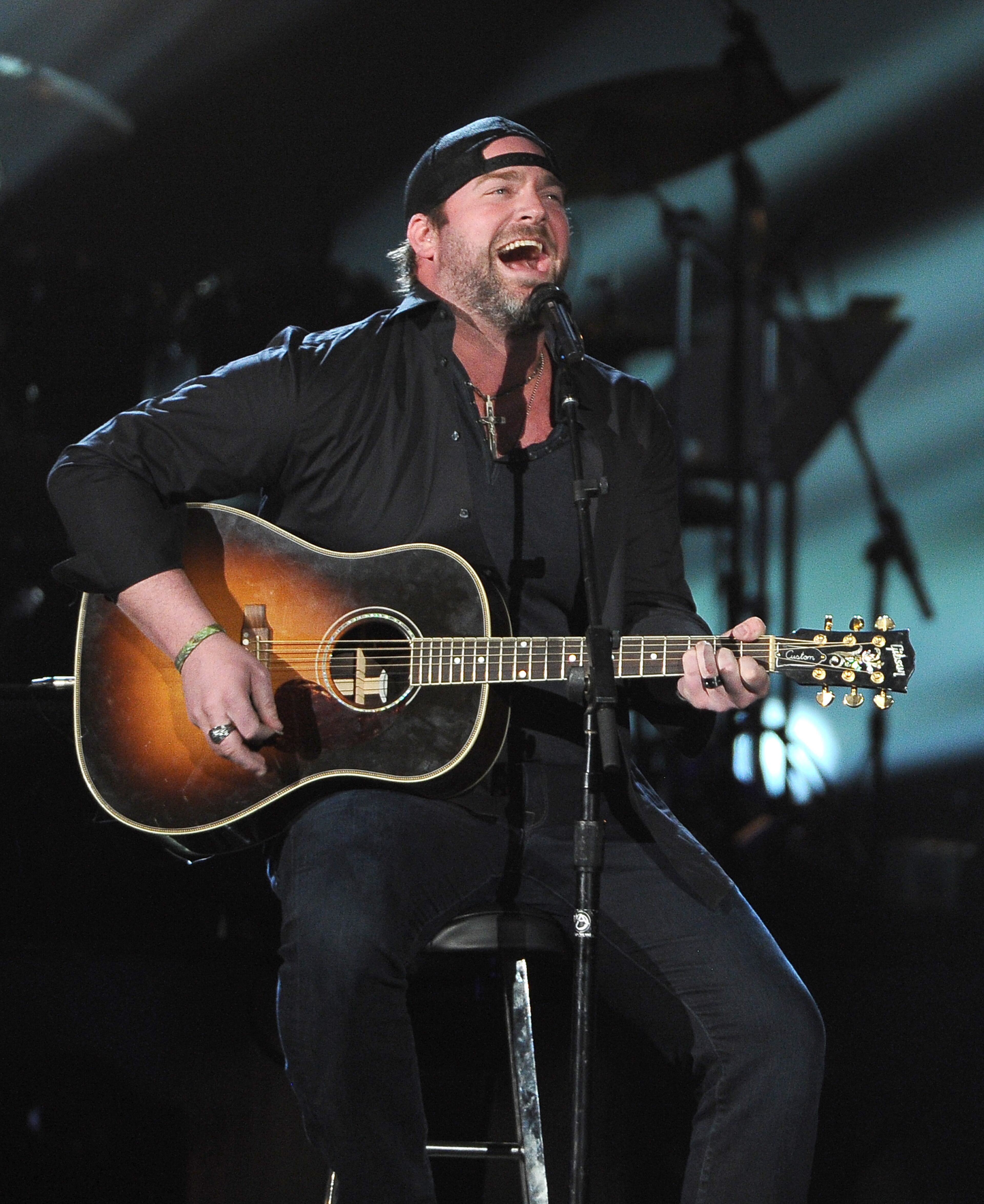 Lee Brice performs at ACM Presents an All-Star Salute to the Troops on Monday, April 7, 2014, in Las Vegas. (Photo by Chris Pizzello/Invision/AP)