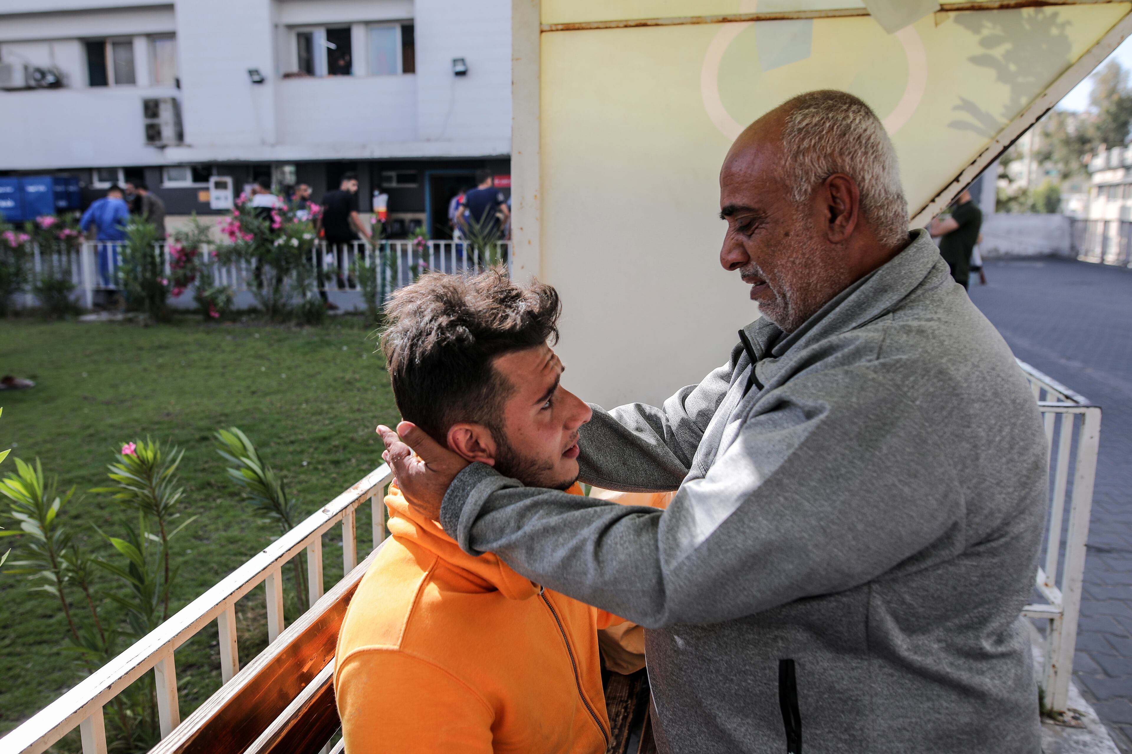 Anas al-Yazji looks for his fiance, Shaimaa Abul Ouf, among the rubble left by an Israeli airstrike in Gaza City, Gaza Strip, May 16, 2021. The Israeli bombing in Gaza City killed at least 33 people, including 12 women and eight children, and wounded 50 others, according to Palestinian health authorities. They said the toll was likely to climb as rescuers picked through the rubble searching for victims and survivors. (Hosam Salem/The New York Times)