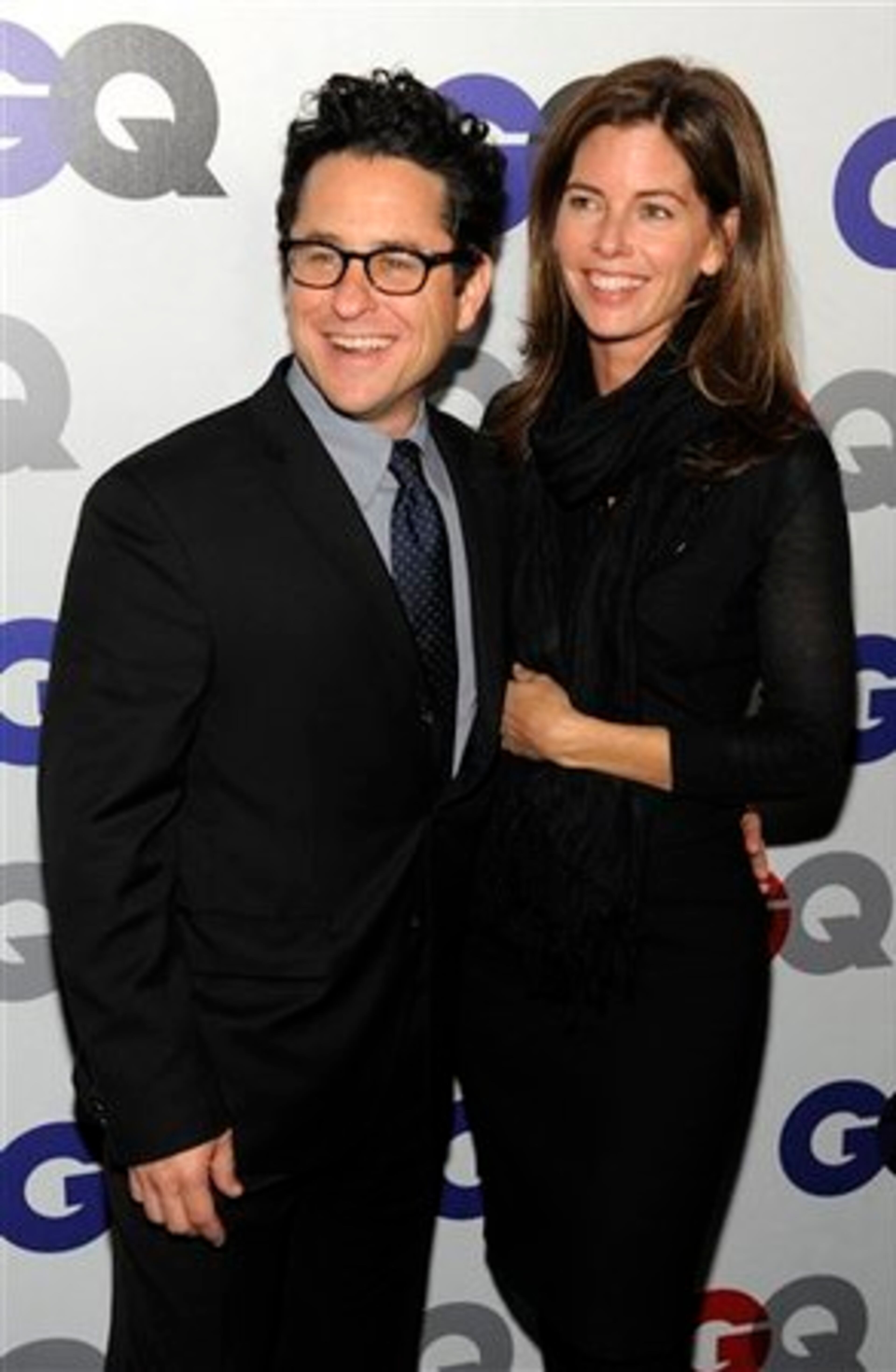 Geek-God filmmaker J.J. Abrams arrives with his wife, Katie.