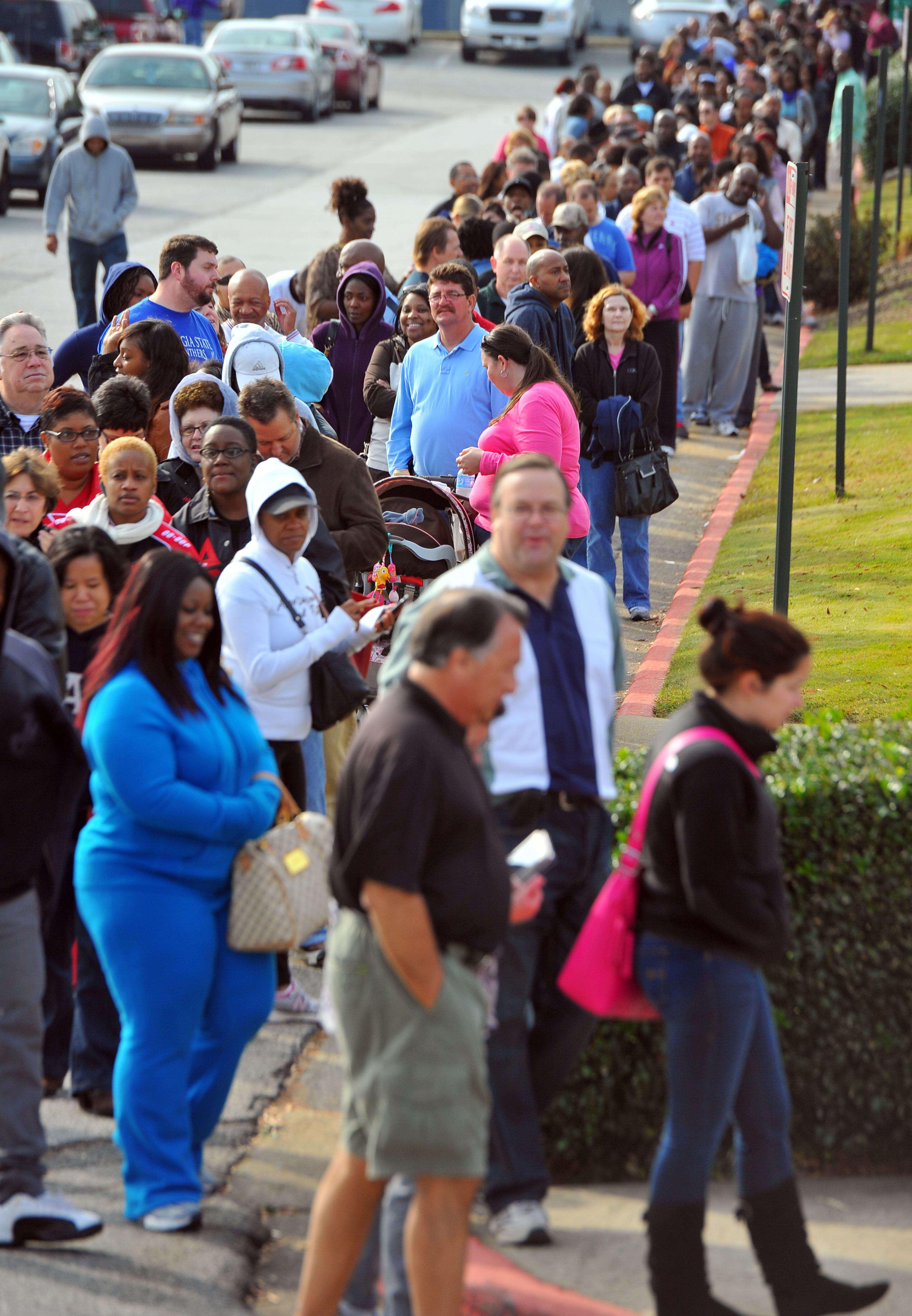 Voters wait in line at the Cobb County Civic Center Saturday morning October 27, 2012. By mid-morning the line contained more than 650 voters, causing more than a 4 hour wait for many. County election offices and several satellite offices were open for early voting. BRANT SANDERLIN / BSANDERLIN@AJC.COM