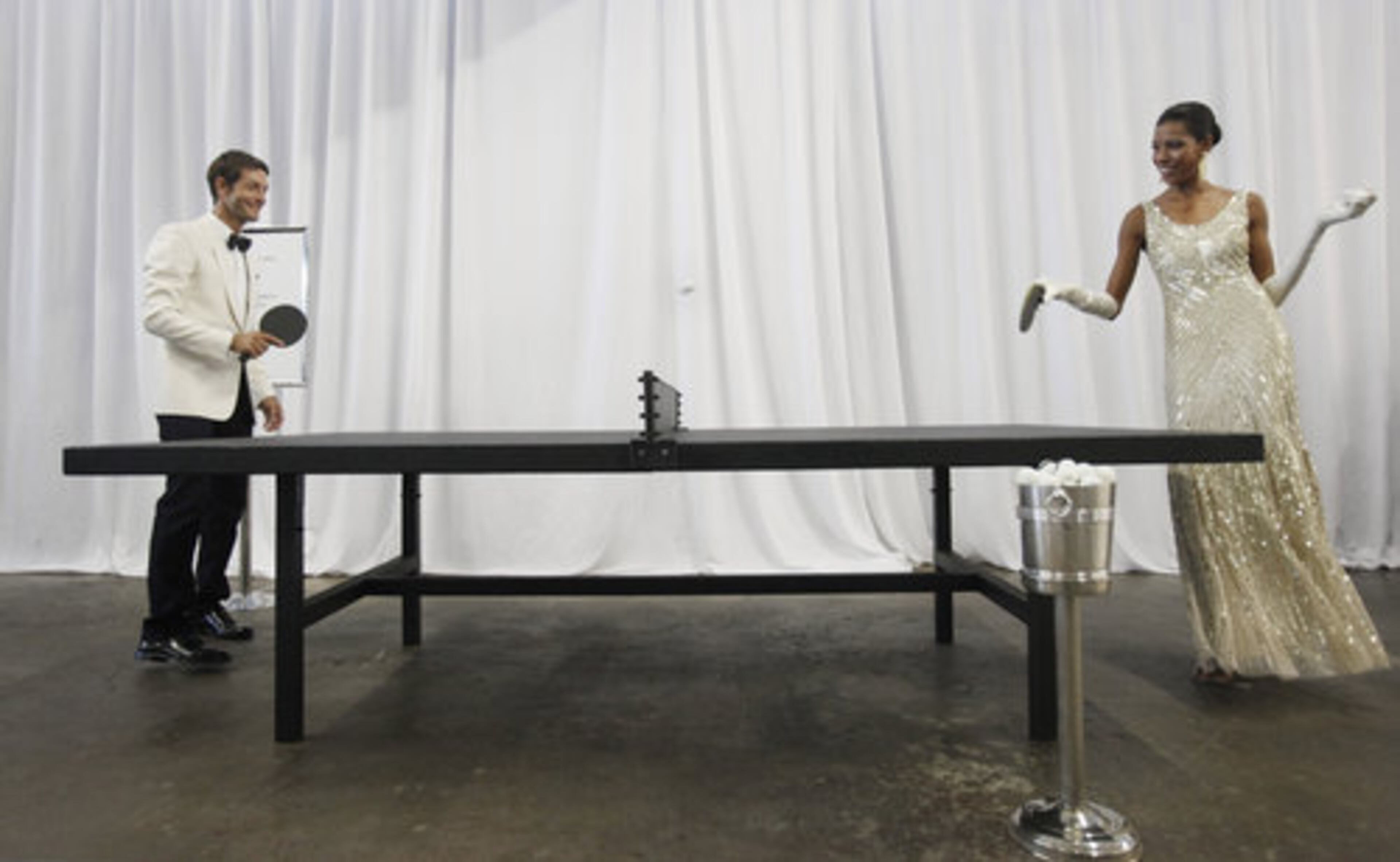 Models Youri Bebik, left, and Carlotta Lennox demonstrate the Tom Burr table tennis table. The limited edition table is sculpted with black rubber and has a price tag of $45,000. Sounds like this is for some serious gamers.