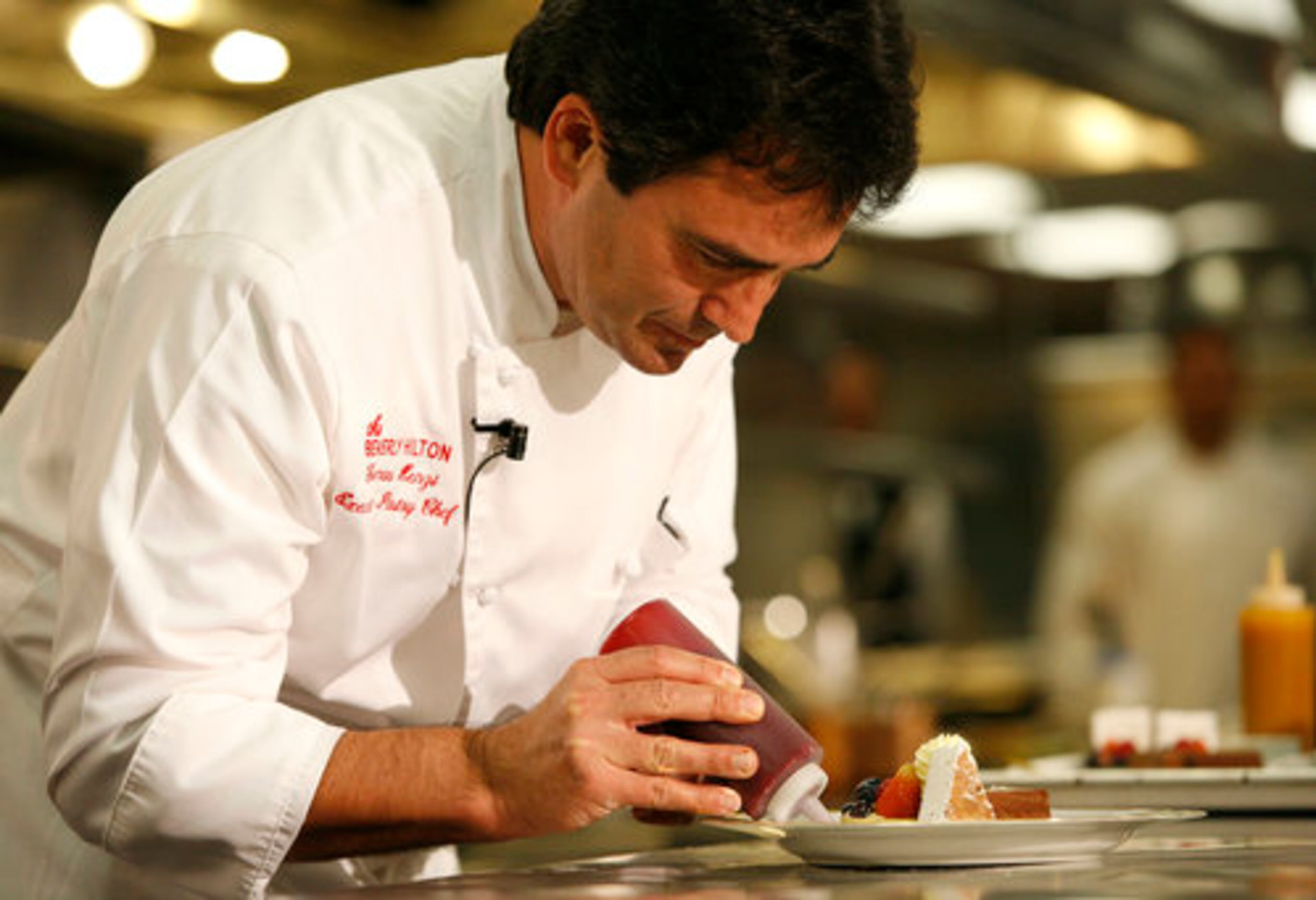 Beverly Hilton executive pastry chef Thomas Henzi prepares his dessert trio.