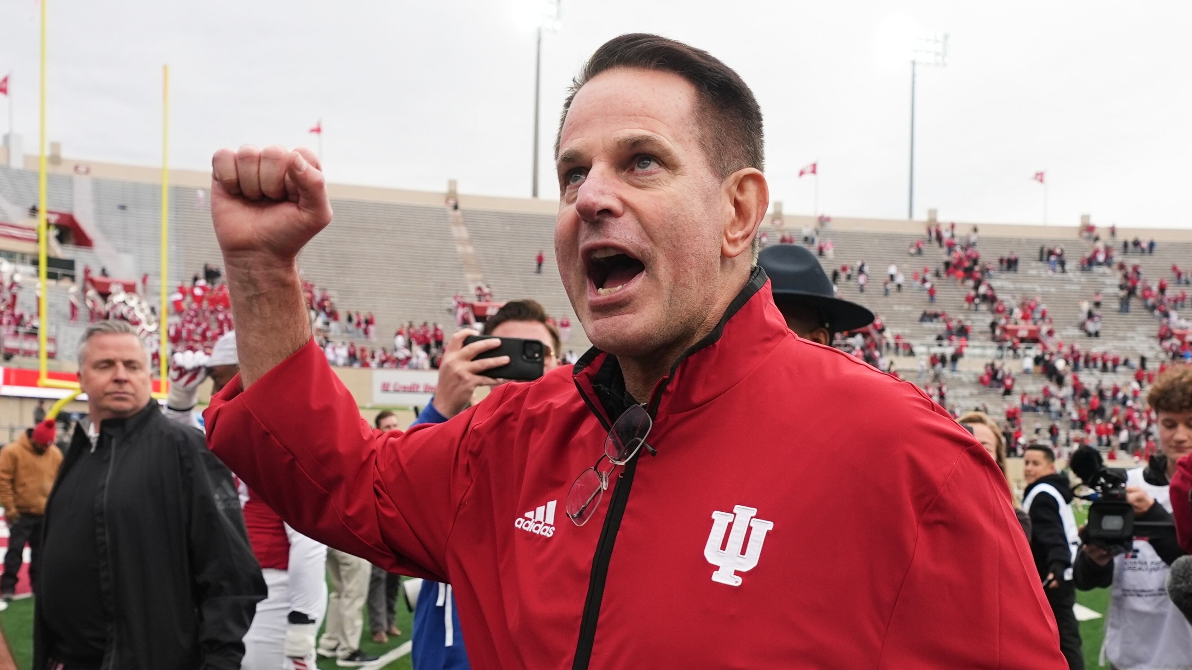 FILE - Indiana head coach Curt Cignetti shouts to the fans as he leaves the field following an NCAA college football game against UCLA, Saturday, Oct. 25, 2025, in Bloomington, Ind. (AP Photo/Darron Cummings, File)
