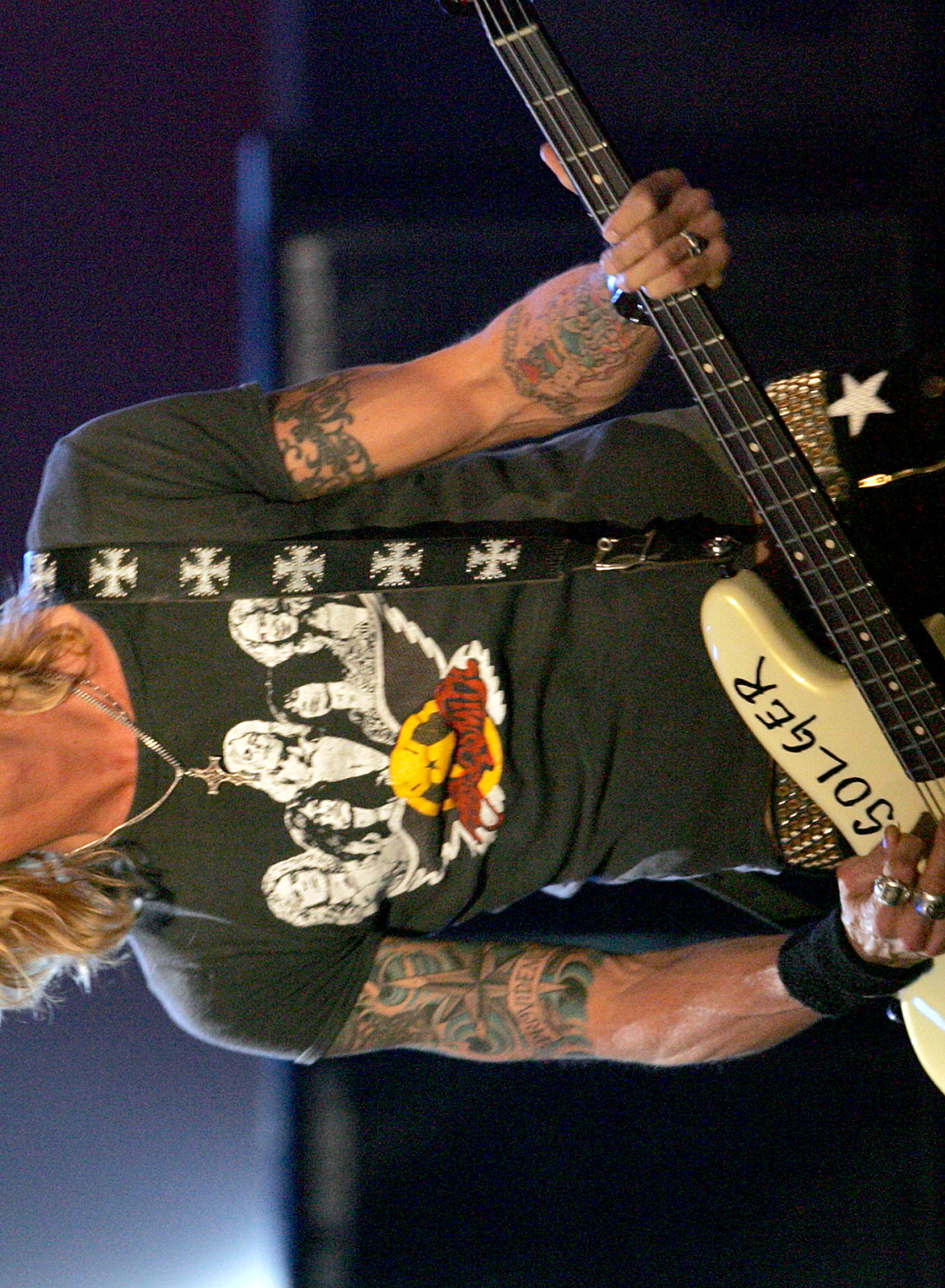 Guns N' Roses musician Duff McKagan was knocked out at while during a 1993 concert by a flying plastic bottle of urine. (Photo by Kevin Winter/Getty Images)
