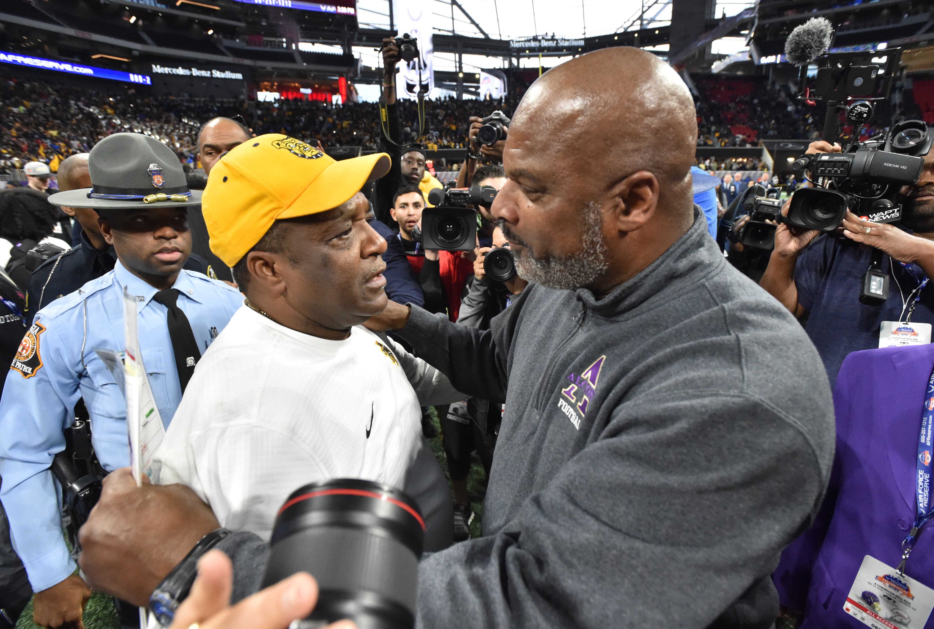 December 15, 2018 Atlanta - North Carolina A&T head coach Sam Washington and Alcorn State head coach Fred McNair shake hands after North Carolina A&T defeat Alcorn State during the 2018 Celebration Bowl at Mercedes-Benz Stadium on Saturday, December 15, 2018. North Carolina A&T won 24-22 over the Alcorn State. HYOSUB SHIN / HSHIN@AJC.COM