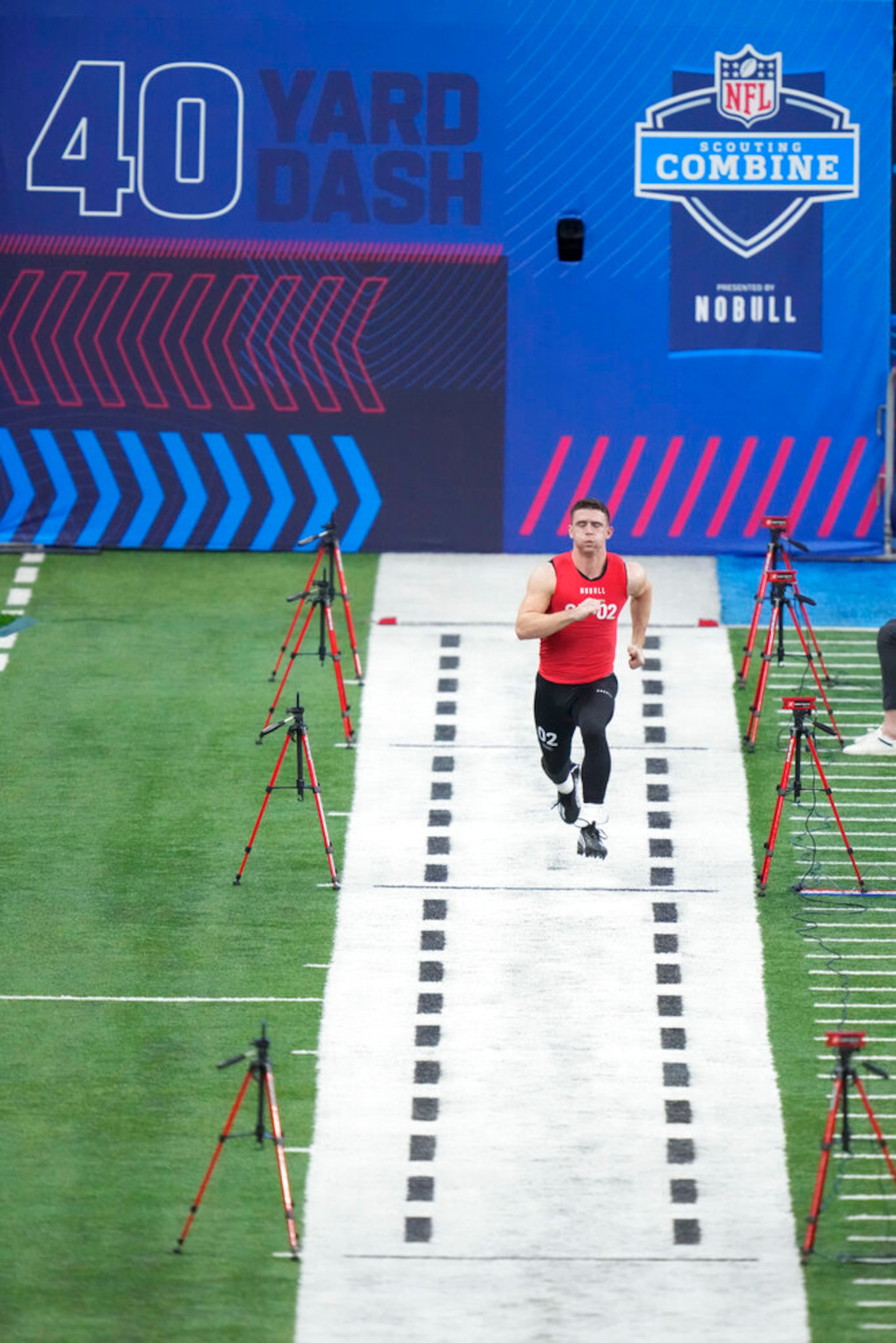 Georgia quarterback Stetson Bennett runs the 40-yard dash at the NFL football scouting combine in Indianapolis, Saturday, March 4, 2023. (AP Photo/Michael Conroy)