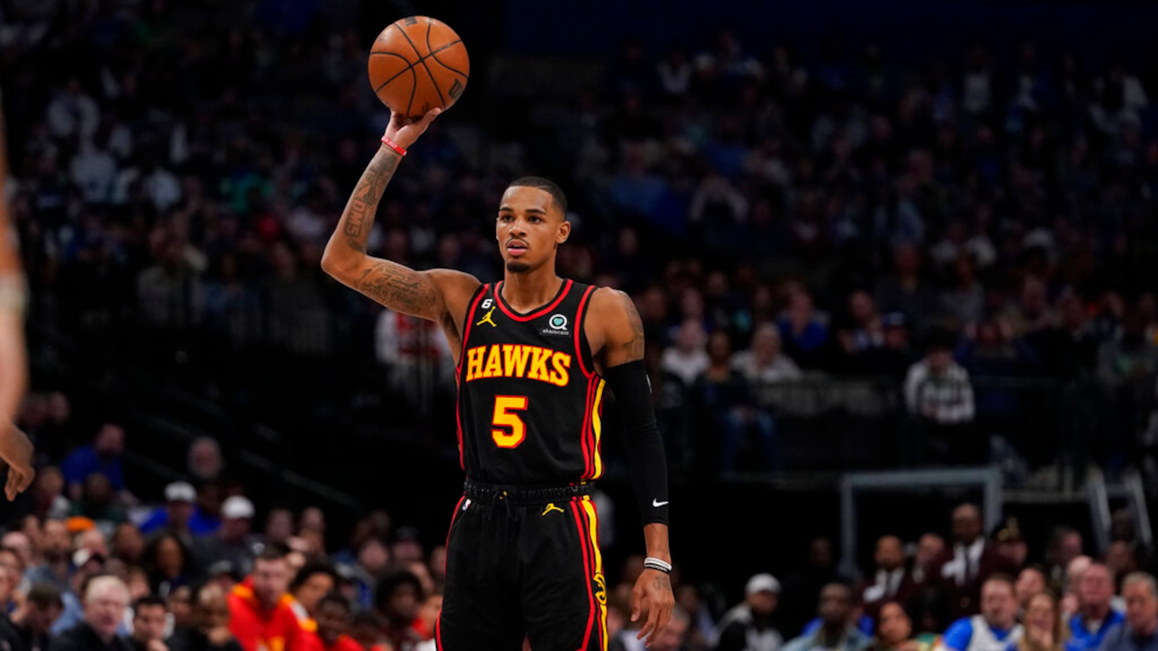 Atlanta Hawks guard Dejounte Murray (5) looks to pass during the second half of an NBA basketball game against the Dallas Mavericks in Dallas, Wednesday, Jan. 18, 2023. (AP Photo/LM Otero)