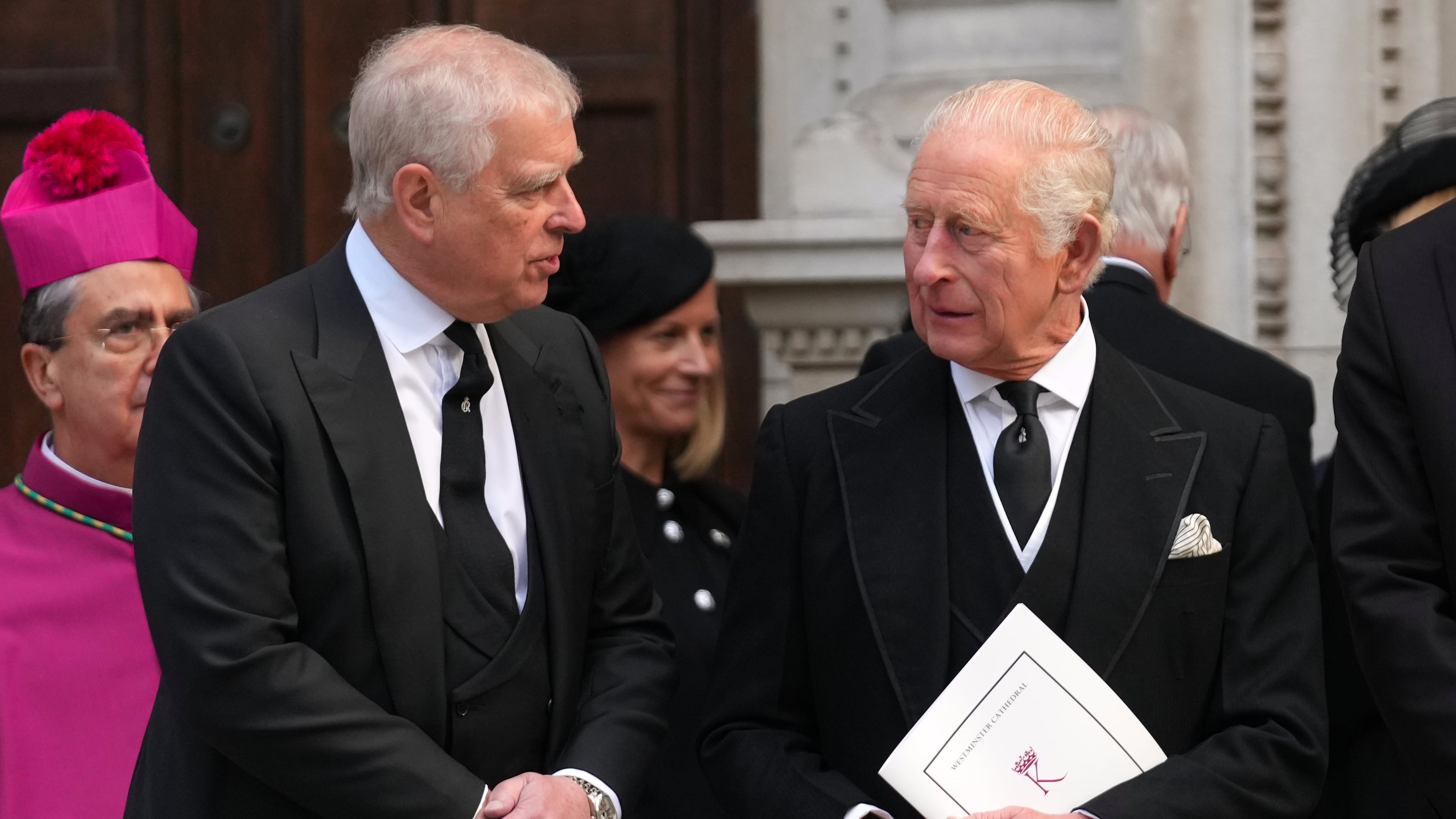 FILE - Britain's Prince Andrew, left, and Britain's King Charles III leave after the Requiem Mass service for the Duchess of Kent at Westminster Cathedral in London, Sept. 16, 2025. (AP Photo/Joanna Chan, File)