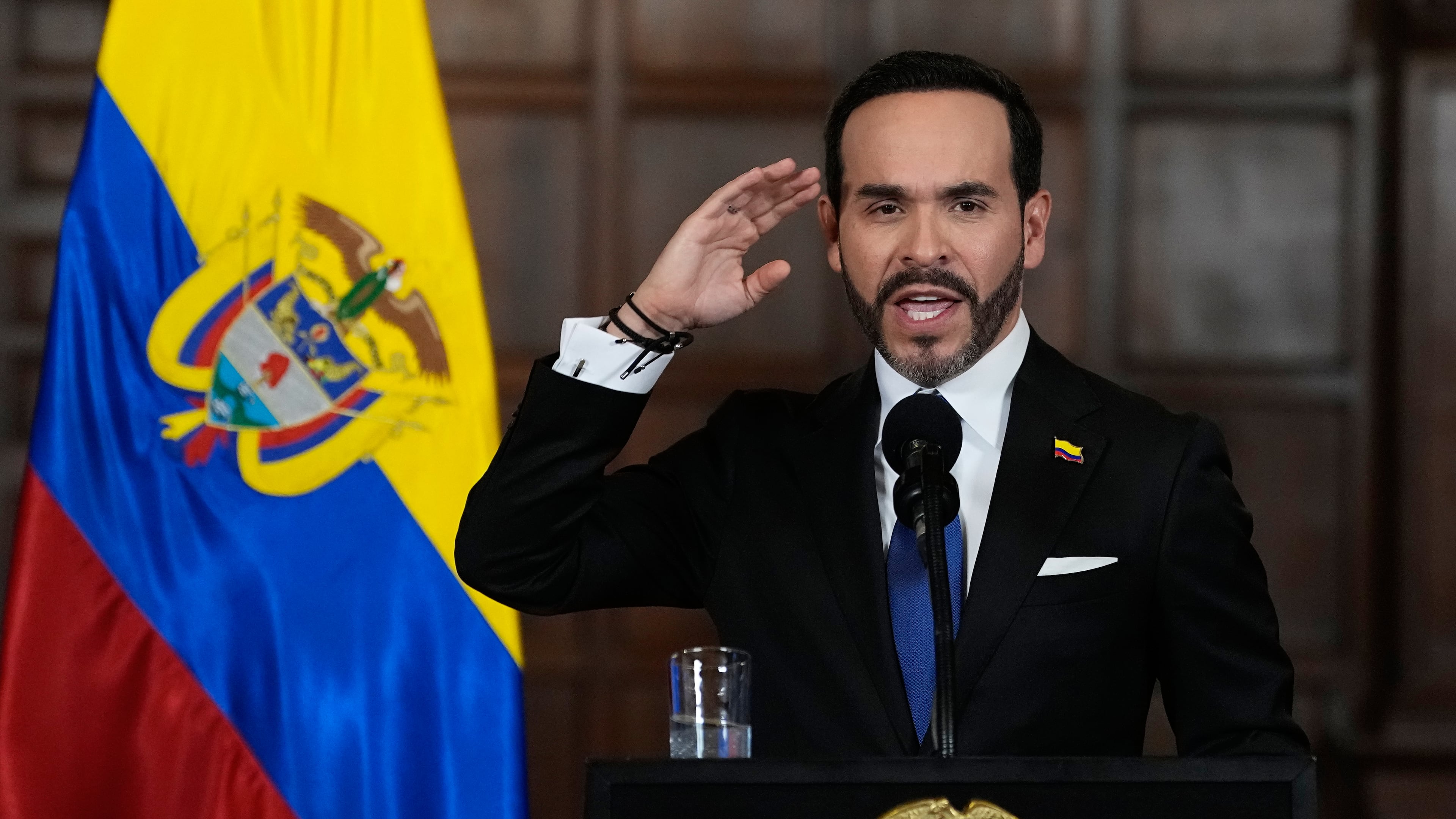 Colombia's President Abelardo De la Espriella announces a joint effort with Bogota's Mayor Carlos Fernando Galan to strengthen security in the Colombian capital through increased police presence, intelligence, technology, and urban capabilities in Bogota, Tuesday, Aug. 25, 2026. (AP Photo/Fernando Vergara)