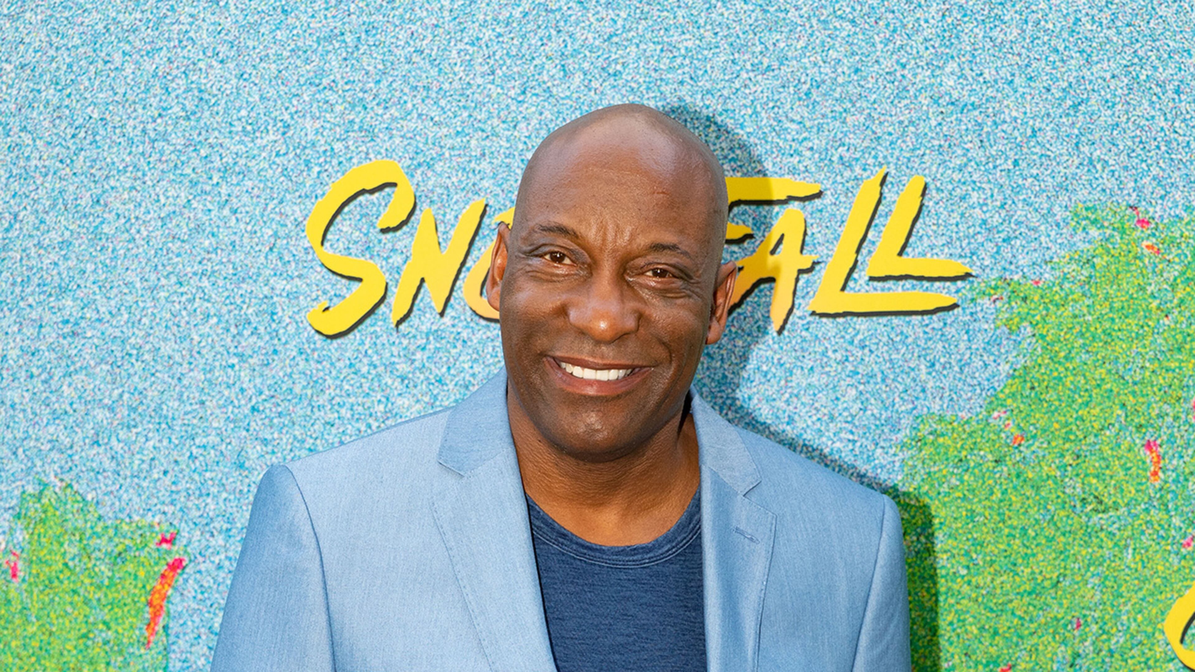 LOS ANGELES, CA - JULY 16: John Singleton arrives to the premiere Of FX's "Snowfall" Season 2 at Regal Cinemas L.A. LIVE Stadium 14 on July 16, 2018 in Los Angeles, California. (Photo by Christopher Polk/Getty Images)