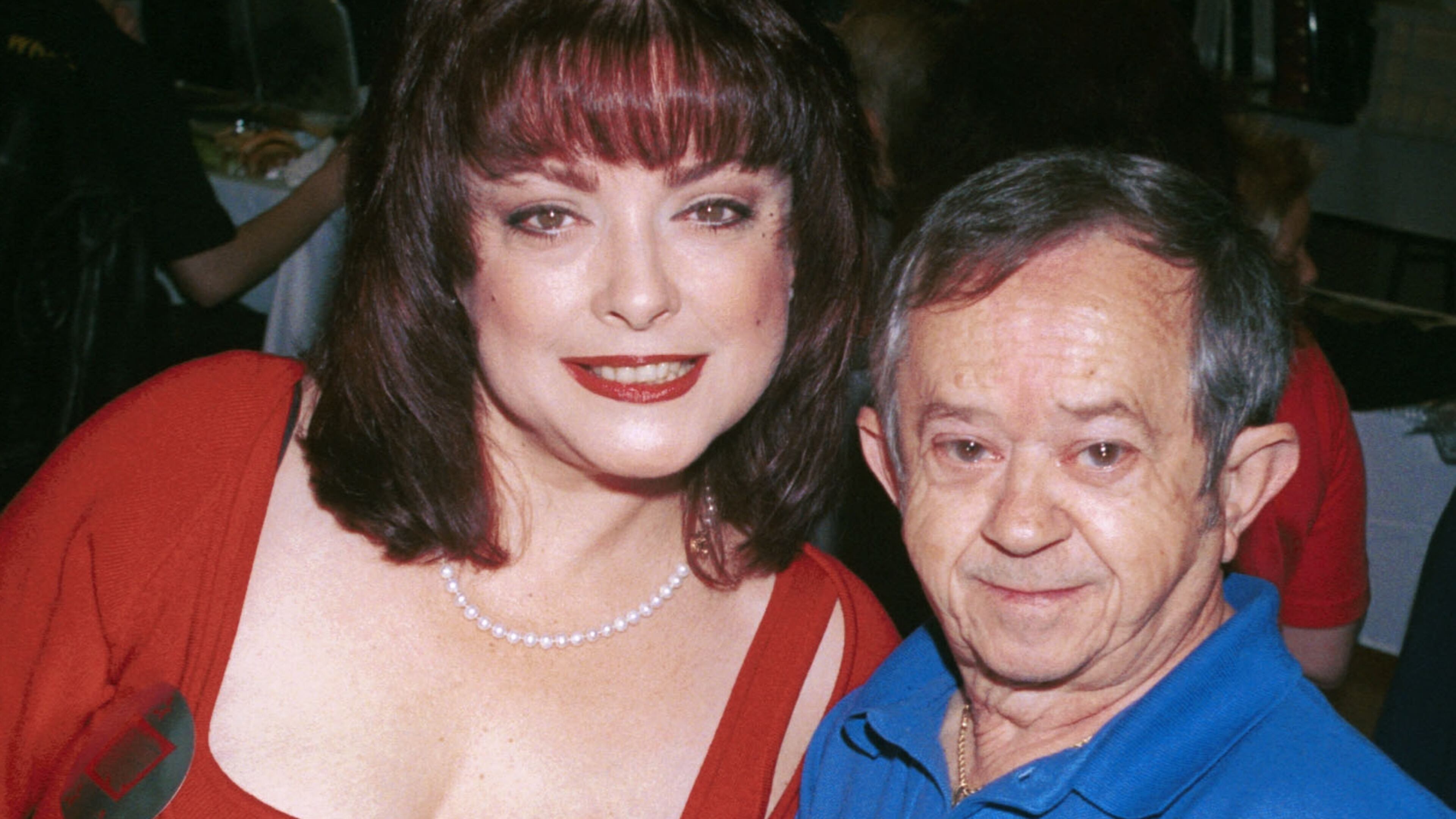 Actors Lisa Loring (Wednesday) and Felix Silla (Cousin Itt) from the mid-1960s television series "The Addams Family" attend the "Hollywood Collectors and Celebrities Show" in 2001. Silla died of pancreatic cancer. He was 84. (Newsmakers/TNS)