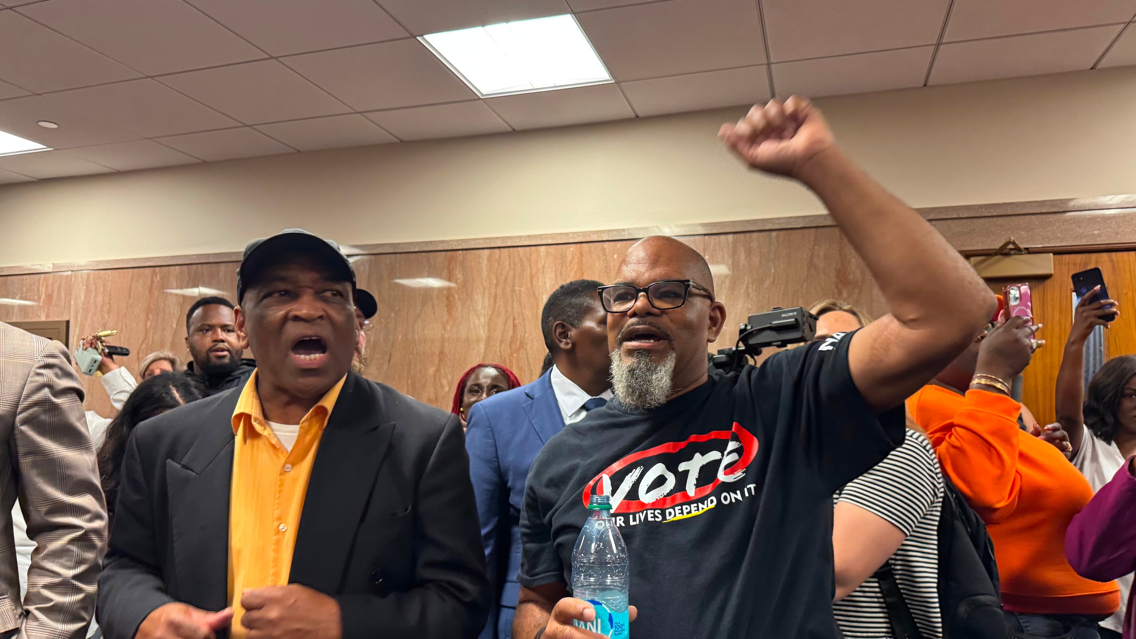 Protestors fill the halls in the Louisiana Legislature in Baton Rouge during a Senate committee hearing Friday, May 8, 2026 on redistricting. (AP Photo/Jack Brook)