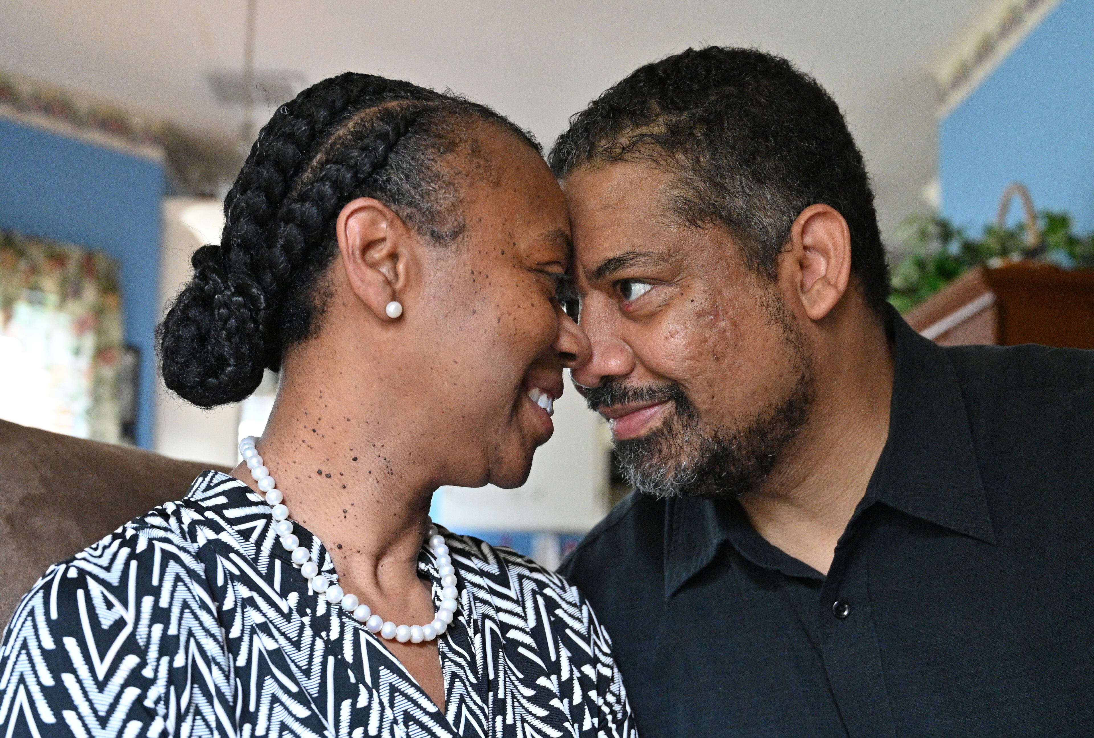 June 10, 2021 Hampton - Portrait of Robert Reid and his wife Kim Reid, who was diagnosed with early-onset AlzheimerÕs, at their home in Hampton on Thursday, June 10, 2021. Hampton resident Robert ReidÕs wife, Kim, then 50, was diagnosed with early-onset AlzheimerÕs on June 15, 2016.(Hyosub Shin / Hyosub.Shin@ajc.com)