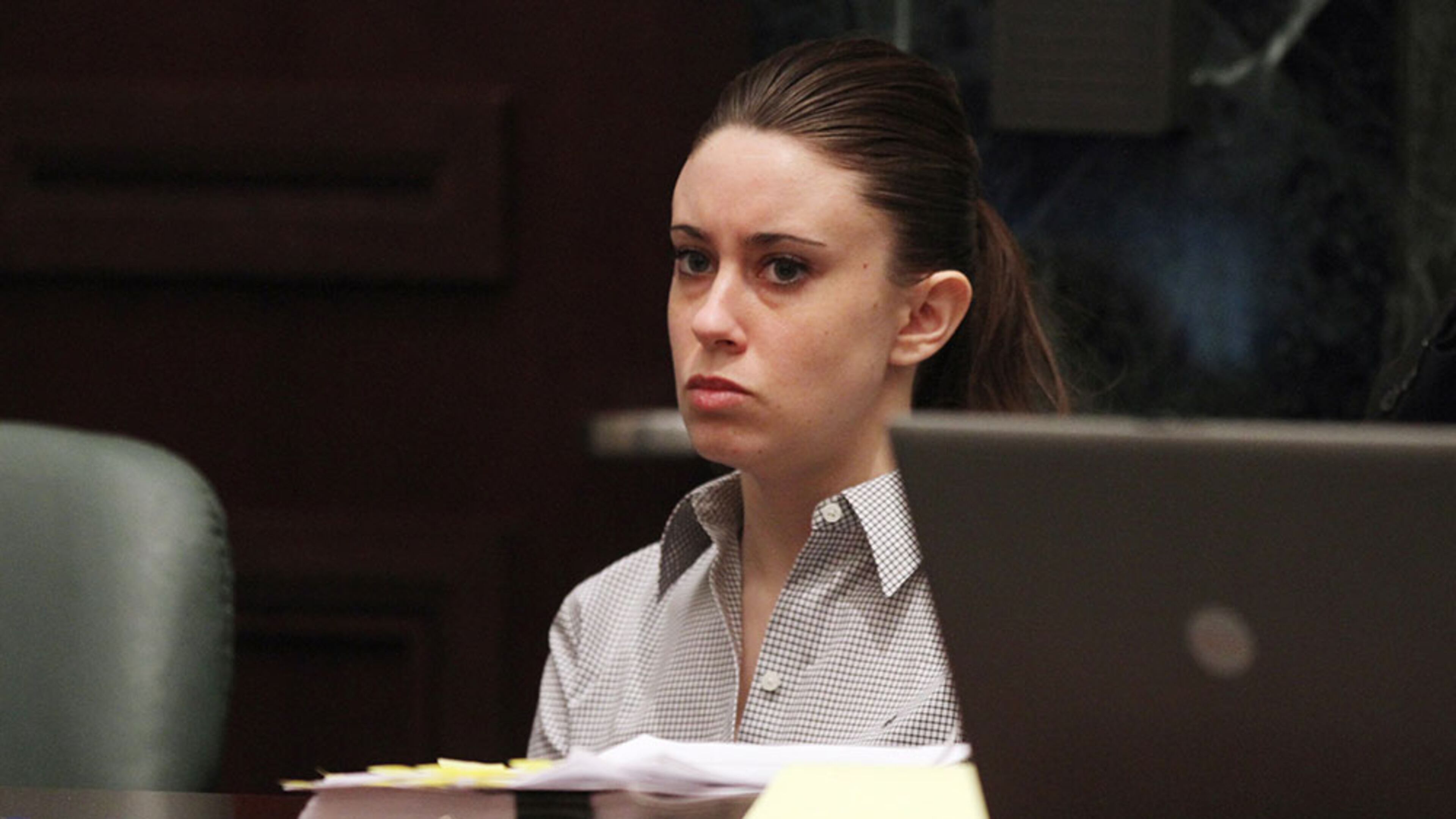 ORLANDO, FL - JUNE 30: Casey Anthony listens to the testimony of Krystal Holloway, who claims to have had an affair with Anthony's father, during her murder trial at the Orange County Courthouse on June 30, 2011 in Orlando, Florida. Anthony's defense attorneys argued that she didn't kill her two-year-old daughter Caylee, but that she accidentally drowned. (Photo by Red Huber-Pool/Getty Images)