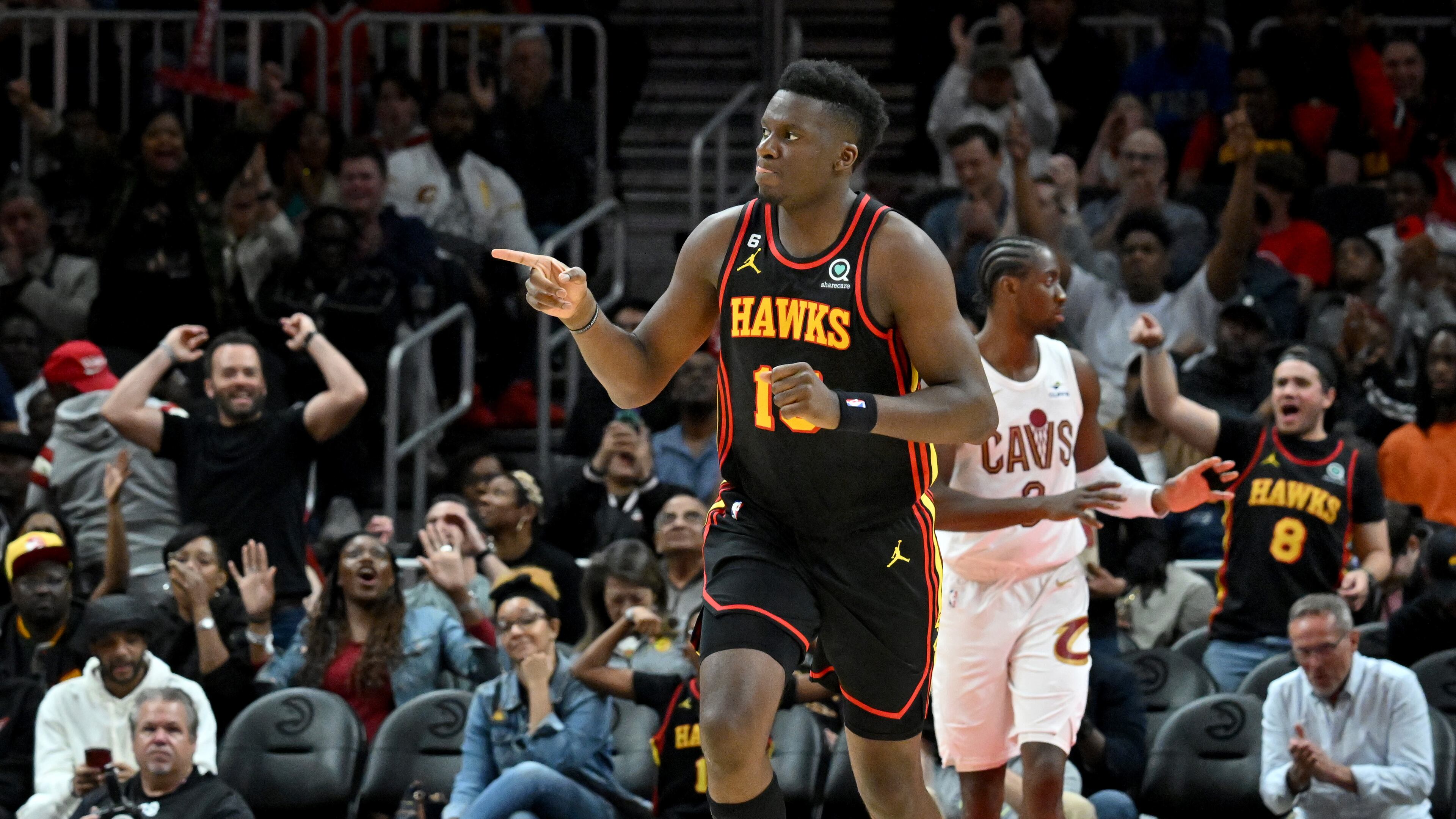 Hawks center Clint Capela (15) celebrates after dunking against the Cavaliers during the second half in a game at State Farm Arena, Tuesday, March 28, 2023, in Atlanta. (Hyosub Shin / Hyosub.Shin@ajc.com)