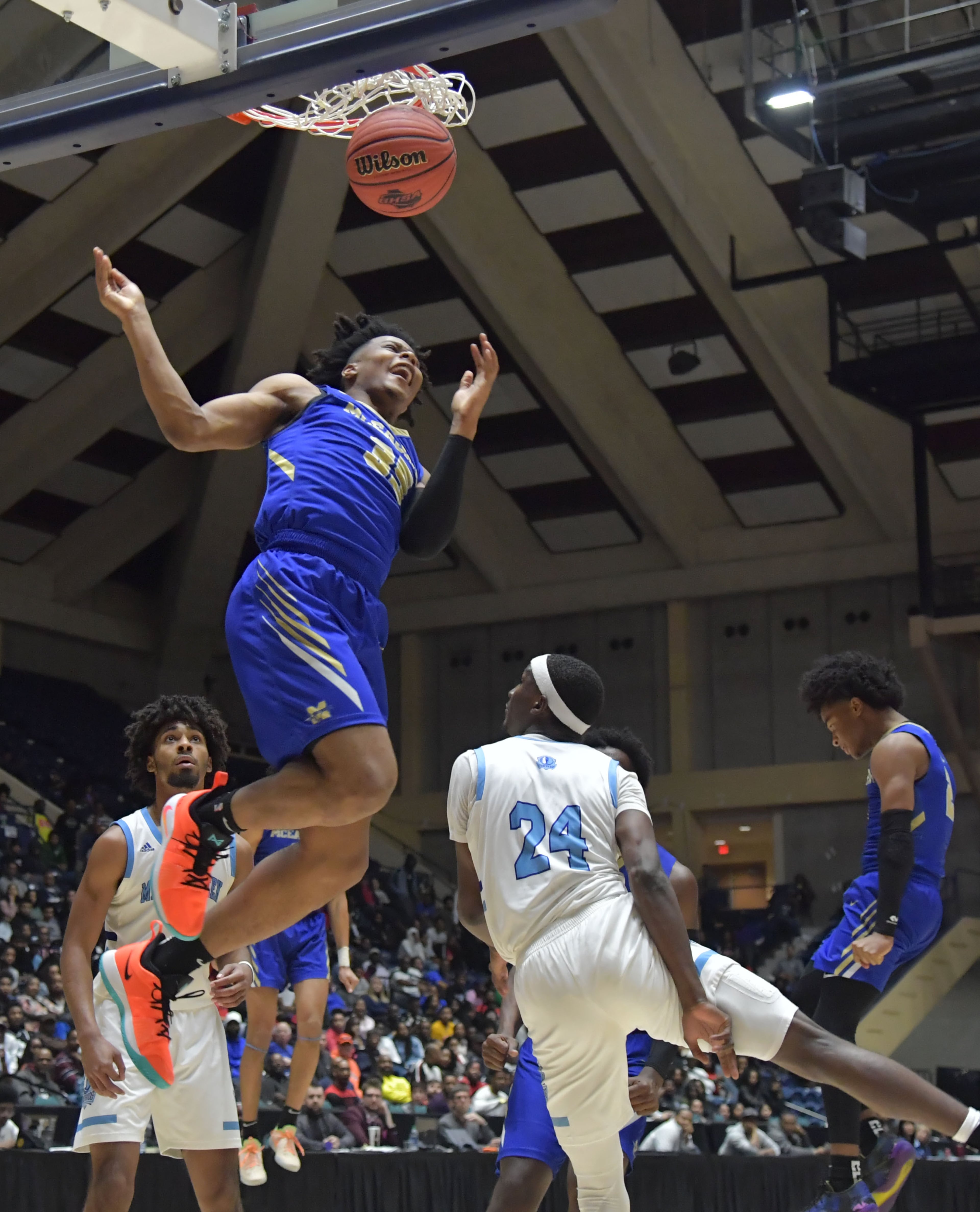 March 9, 2019 Macon - McEachern Isaac Okoro (35) ducks the ball against Meadowcreek in GHSA State Basketball Championship game at the Macon Centreplex in Macon on Saturday, March 9, 2019. McEachern won 62-54 over the Meadowcreek. HYOSUB SHIN / HSHIN@AJC.COM