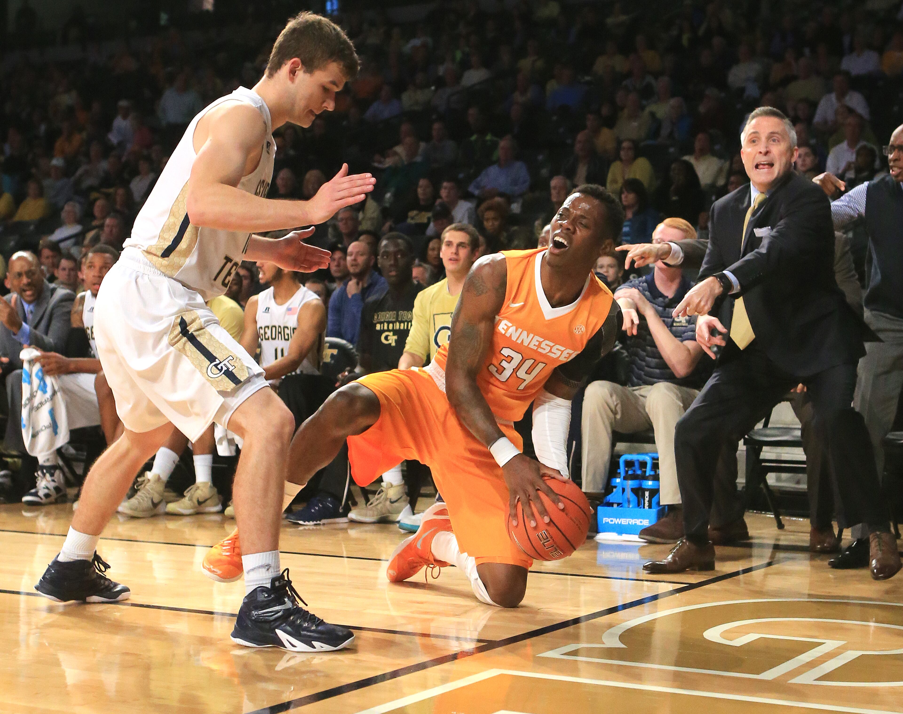 Georgia Tech head coach Brian Gregory reacts as Tennessee guard Devon Baulkman goes out of bounds under pressure from defender Travis Jorgenson turning it over to Georgia Tech during the first half in a basketball game on Monday, Nov. 16, 2015 in Atlanta. Curtis Compton / ccompton@ajc.com