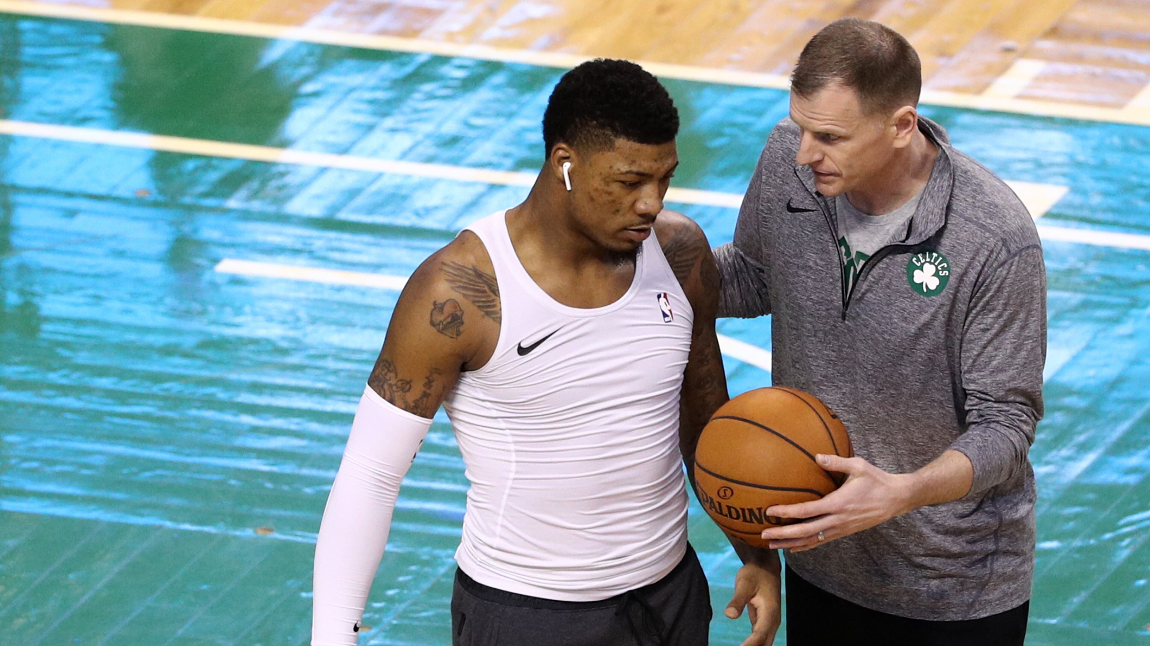 Celtics assistant coach Jay Larranaga works with Marcus Smart before Game Five of Round One of the 2018 NBA Playoffs April 24, 2018, against the Milwaukee Bucks at TD Garden in Boston.