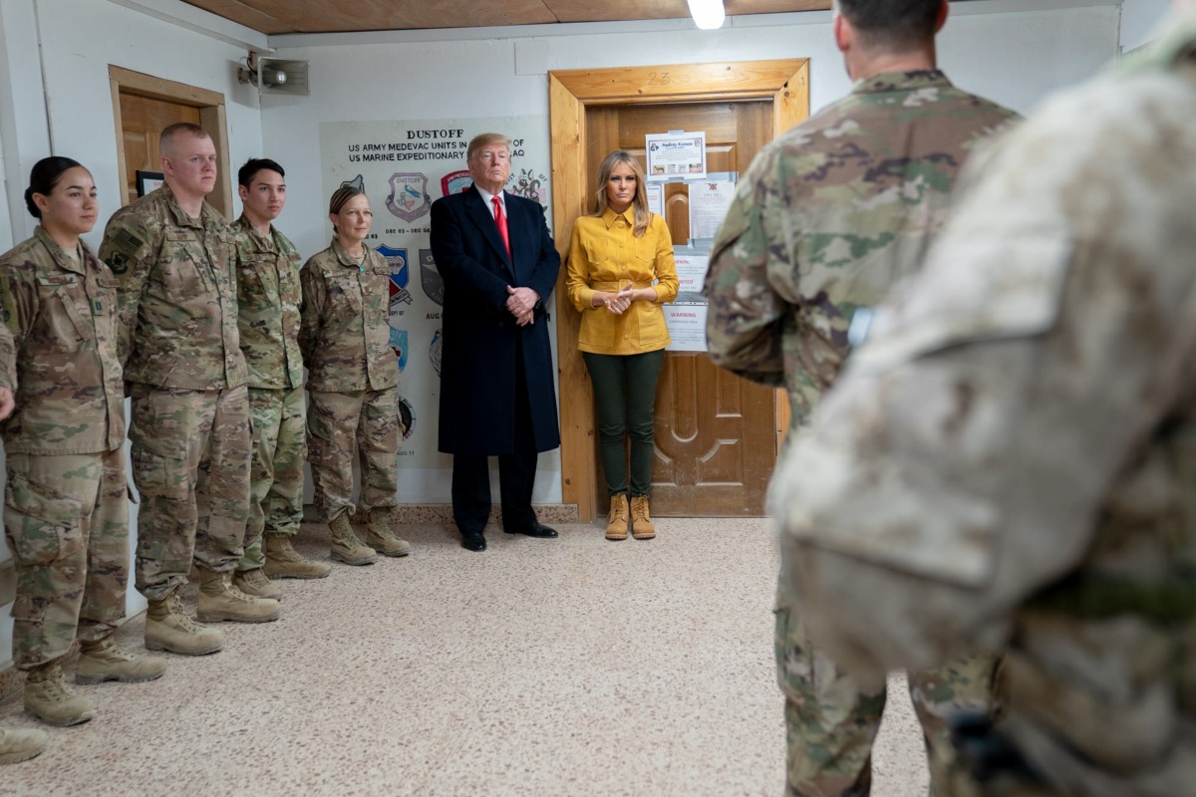 President Donald J. Trump and First Lady Melania Trump participate in a demonstration by U.S. Pararescue personnel Wednesday, December 26, 2018, of military equipment and field kits at the Al-Asad Airbase in Iraq.