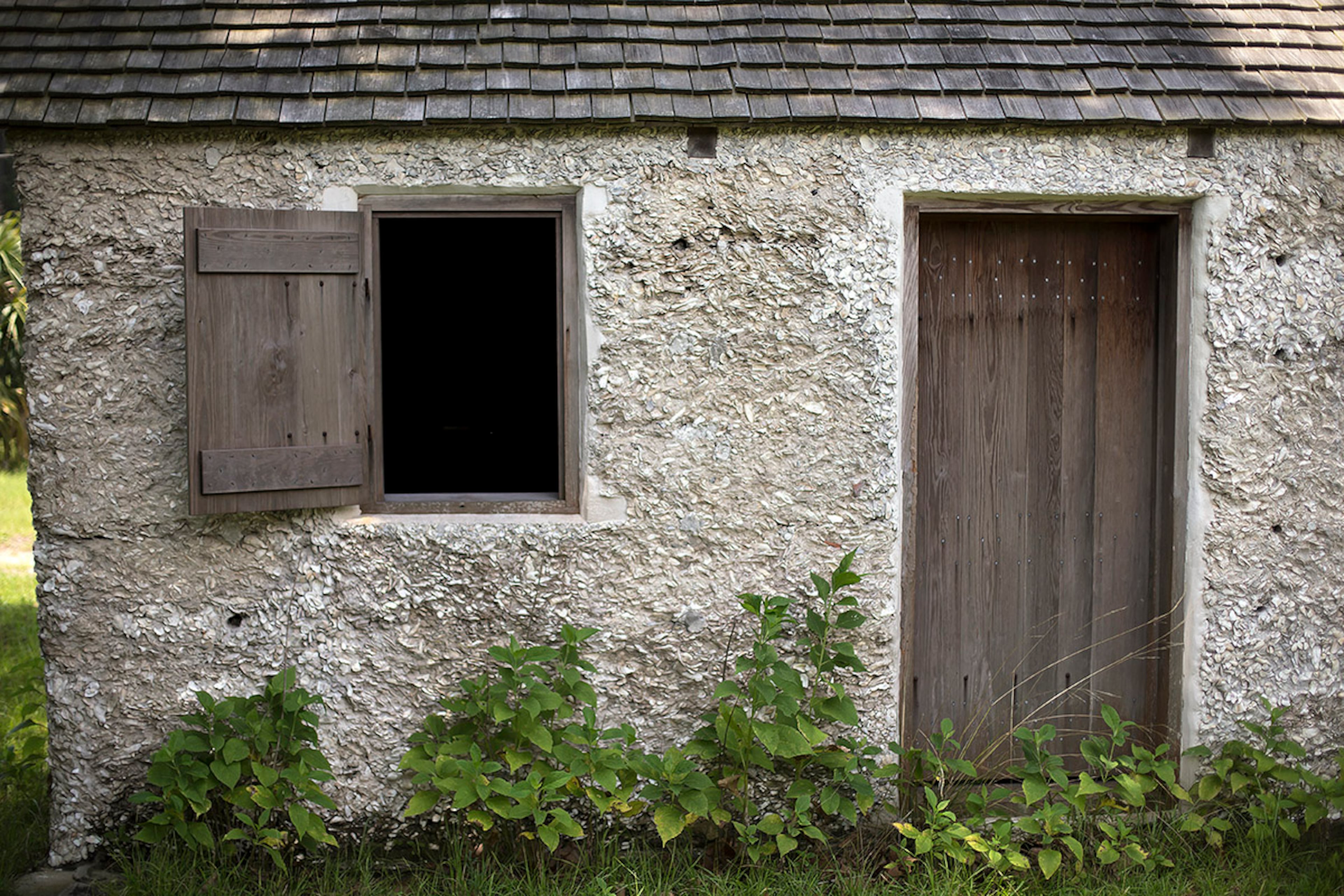 Tabby cabin #1, built in 1820, is known to have had basic shutter windows and a plank door. (AJC Photo/Stephen B. Morton)