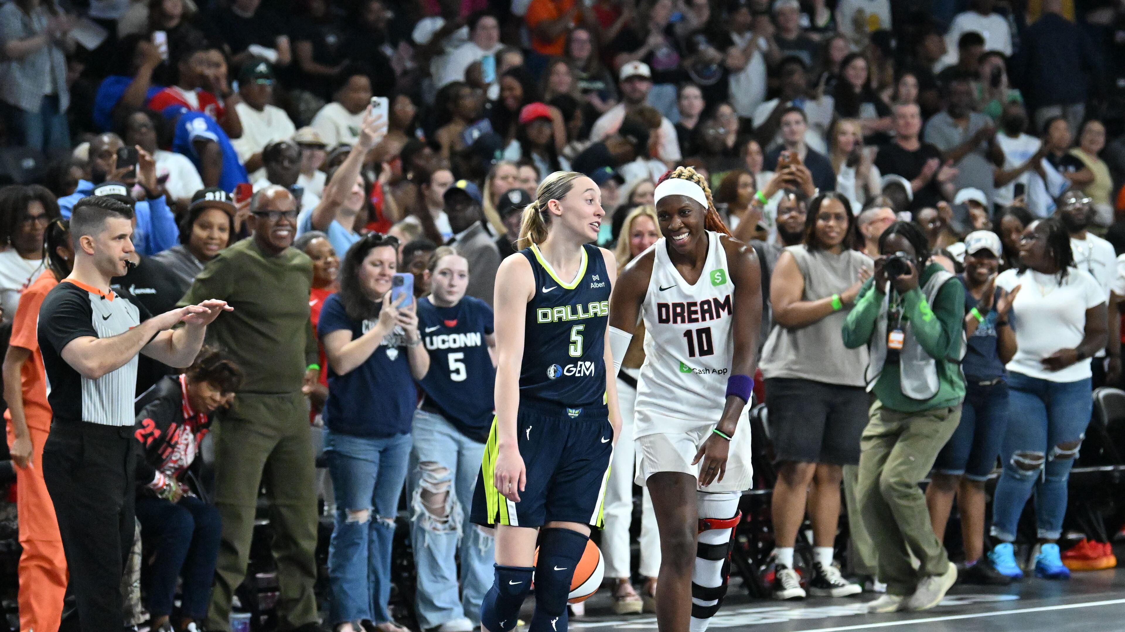 “Our confidence is not going to waver because we didn’t shoot well tonight,” said Atlanta Dream guard Rhyne Howard, shown here last month with Dallas Wings guard Paige Bueckers. (Hyosub Shin / AJC)