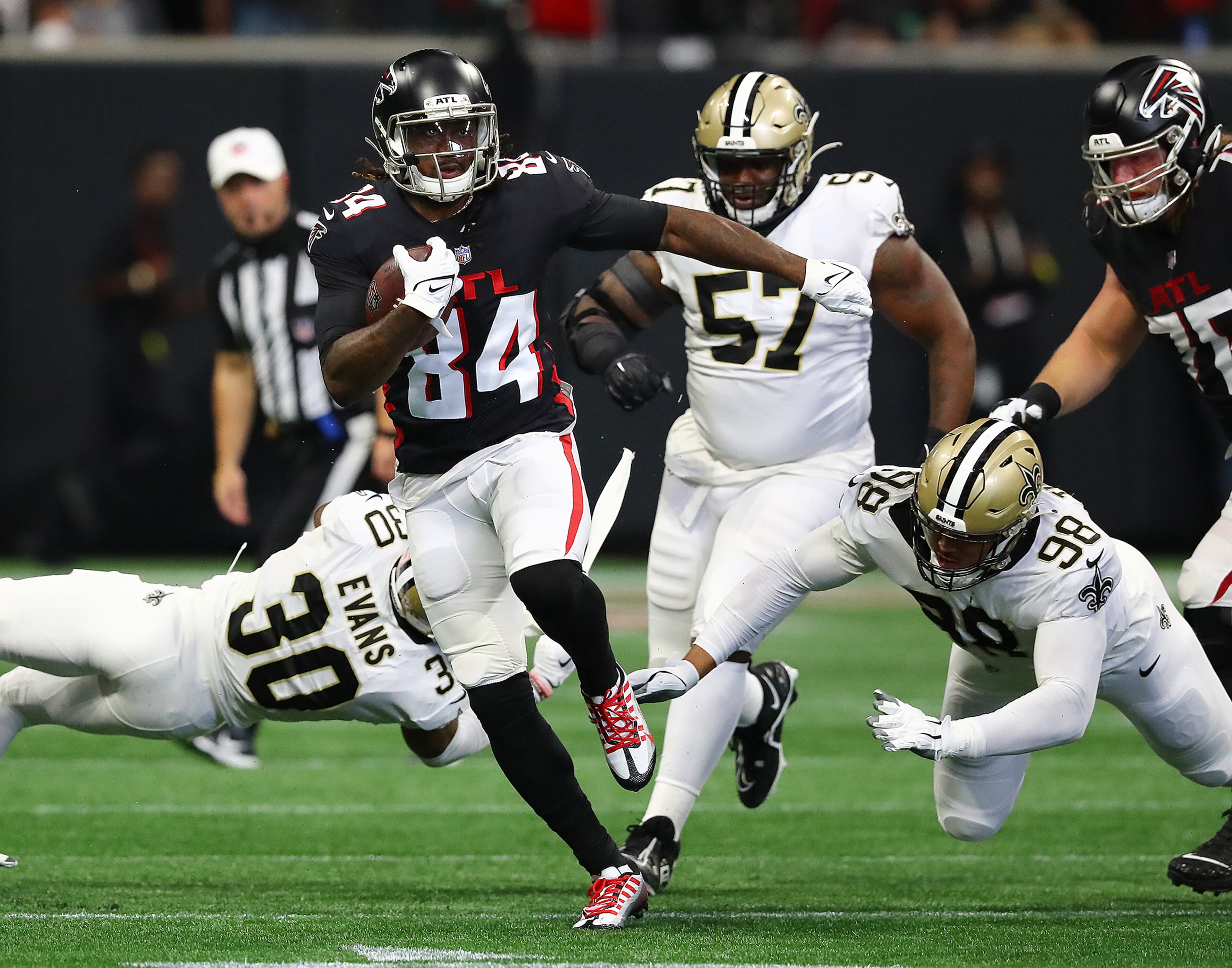 Falcons running back Cordarrelle Patterson makes a first down against the Saints during the first quarter Sunday in Atlanta. (Curtis Compton / Curtis Compton@ajc.com)