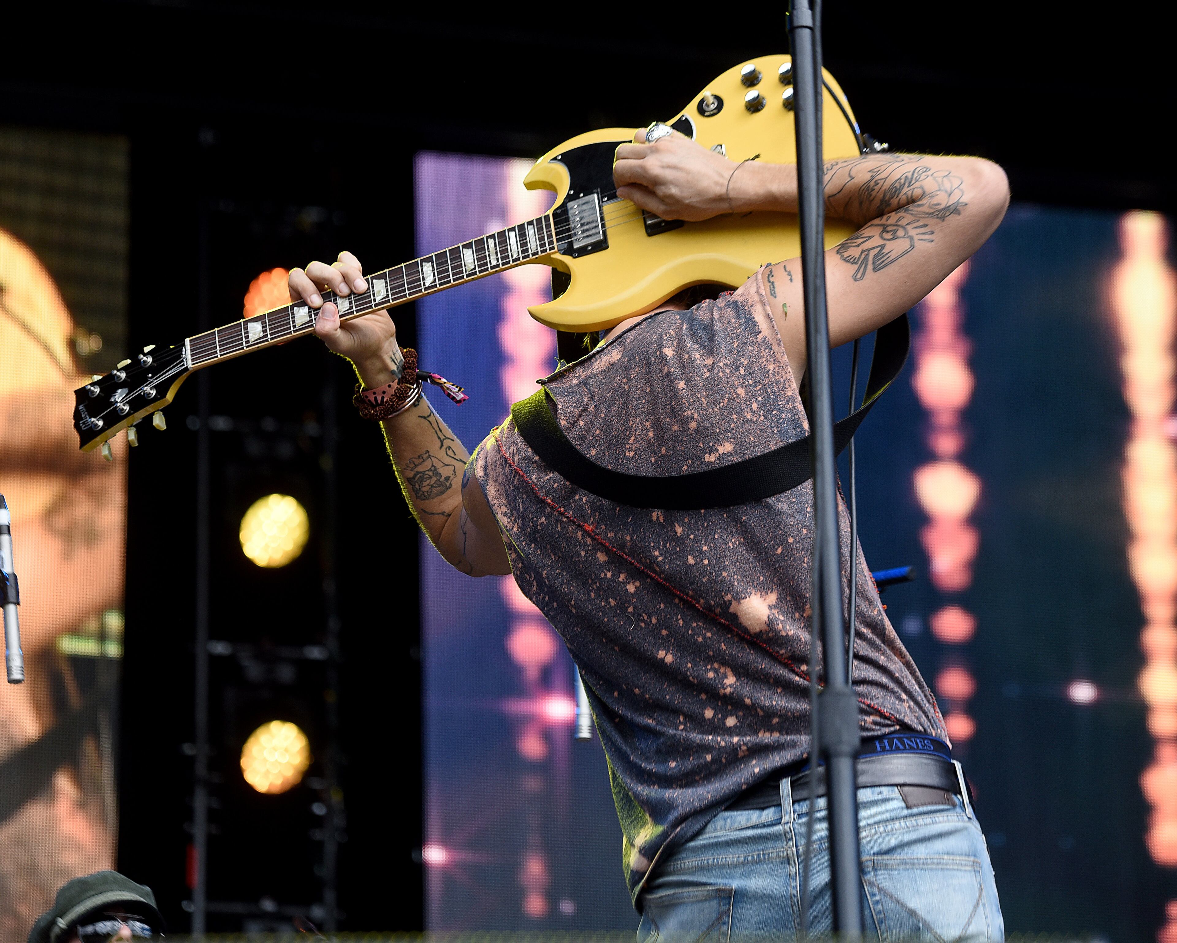 Frontman Joseph Arthur of the band Arthur Buck gets creative on the Great Southeast Music Hall Stage at Music Midtown on Saturday, Sept. 15, 2018. The two-day music festival includes Imagine Dragons, Kendrick Lamar and Post Malone. (Photo: RYON HORNE/RHORNE@AJC.COM)