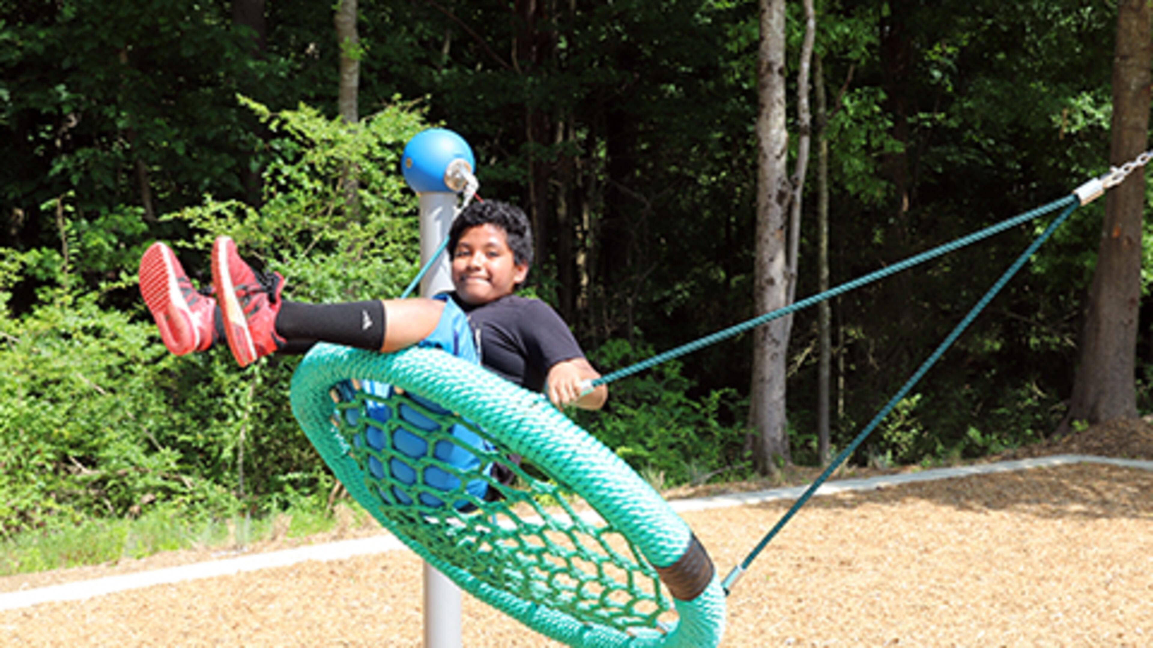 A visitor enjoys the new additions to Club Drive Park near Lawrenceville. SPECIAL PHOTO / GWINNETT COUNTY