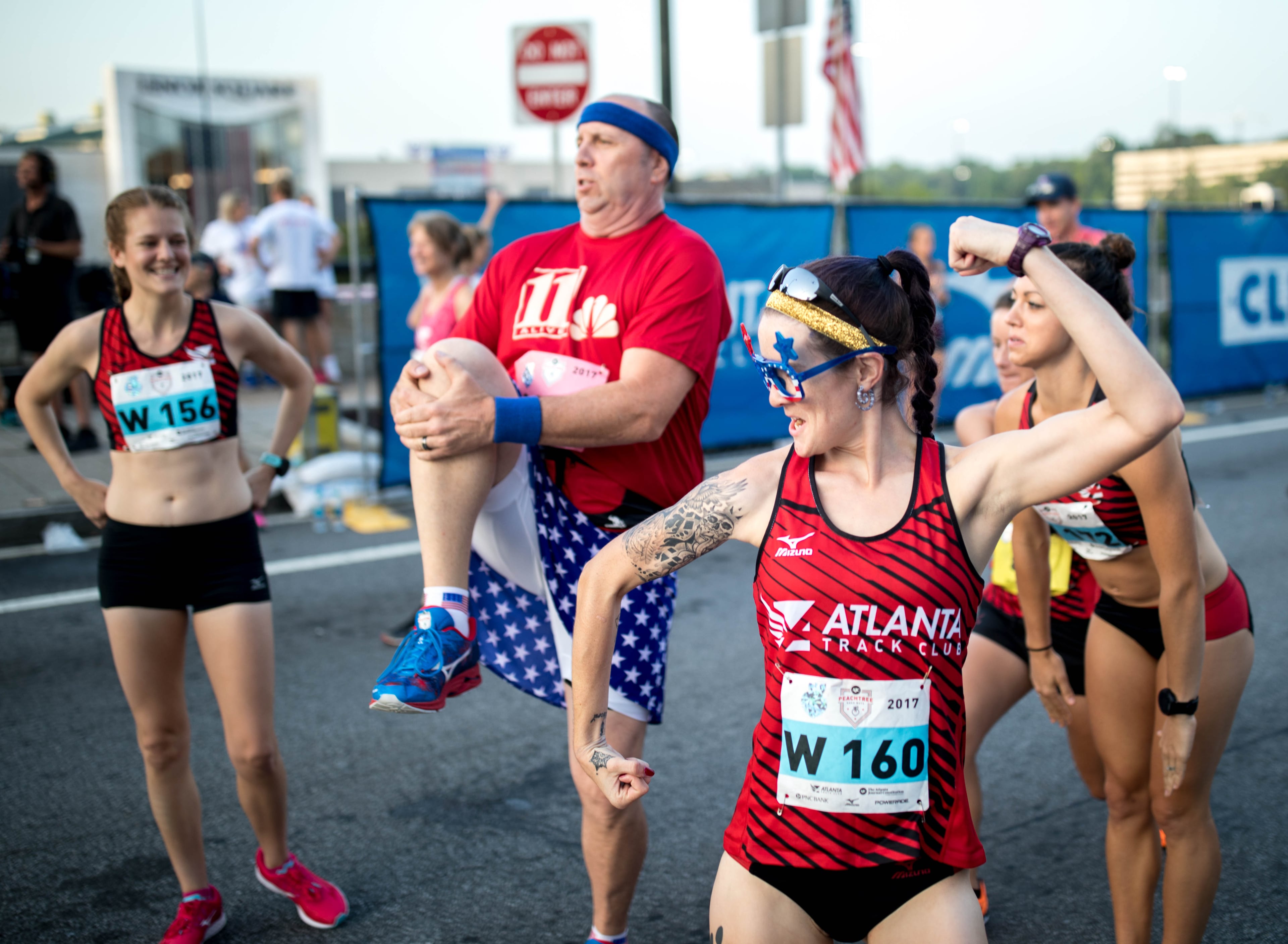 Runners warm up before the 48th AJC Peachtree Road Race, Tuesday, July 4, 2017, in Atlanta. BRANDEN CAMP/SPECIAL