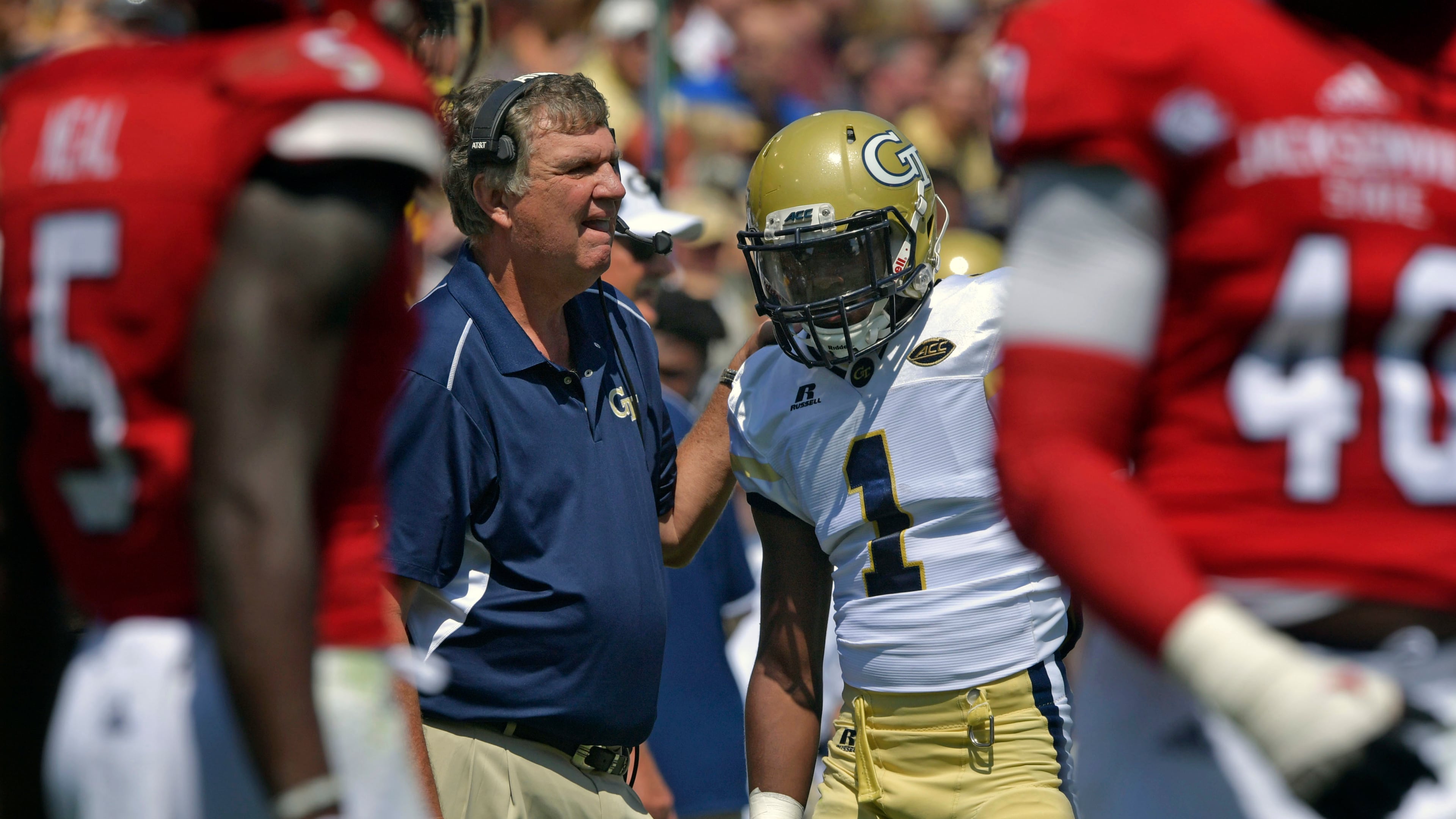Georgia Tech head coach Paul Johnson instructs running back Qua Searcy (1) during the first half of an NCAA college football game against Jacksonville State, Saturday, Sept. 9, 2017 in Atlanta. Georgia Tech defeated Jacksonville State 37-10. (Hyosub Shin/Atlanta Journal-Constitution via AP)