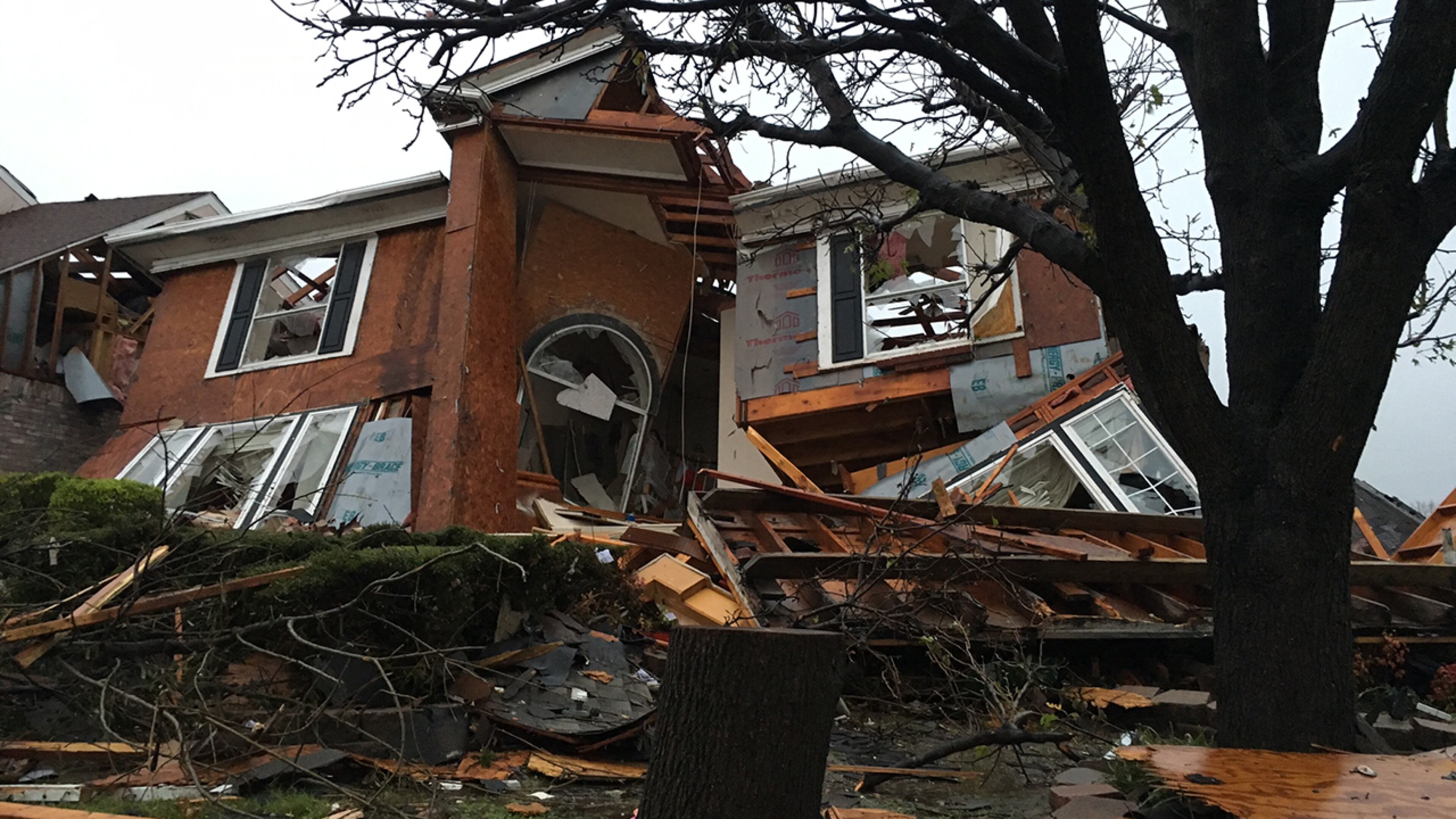 Damage of a house is seen after Saturday's tornado spread out in Rowlett, Texas, Sunday, Dec. 27, 2015. At least 11 people died and dozens were injured in apparently strong tornadoes that swept through the Dallas area and caused substantial damage this weekend. (AP Photo/David Warren)