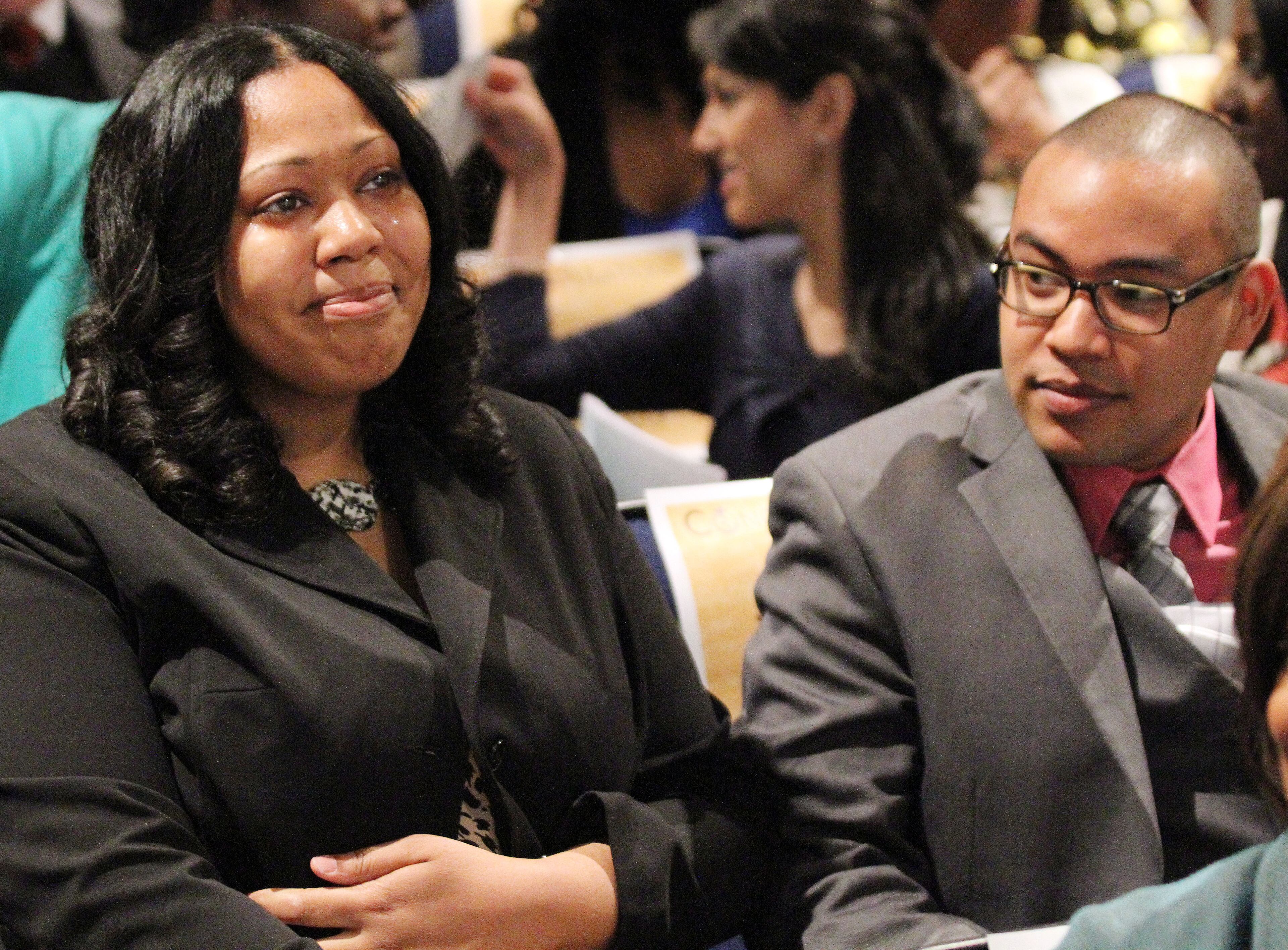 Morehouse School of Medicine class of 2013 student Charisma Manley gets teary eyed next to Jason Payne as they wait to find out where they will spend their residency during the 29th Match Day ceremony at the Atlanta institution on Friday March 15th, 2013. Students, parents & family gathered at the Louis W. Sullivan National Center for Primary Care Auditorium to open their envelopes one by one to announce their future. At Morehouse, 50 percent of those students will enter primary care, nowhere near enough to fill the deepening shortage of the more than 16, 000 needed to meet current health care needs. Primary care includes family medicine, general internal medicine, general pediatrics, preventive medicine, geriatric medicine and osteopathic general practice.