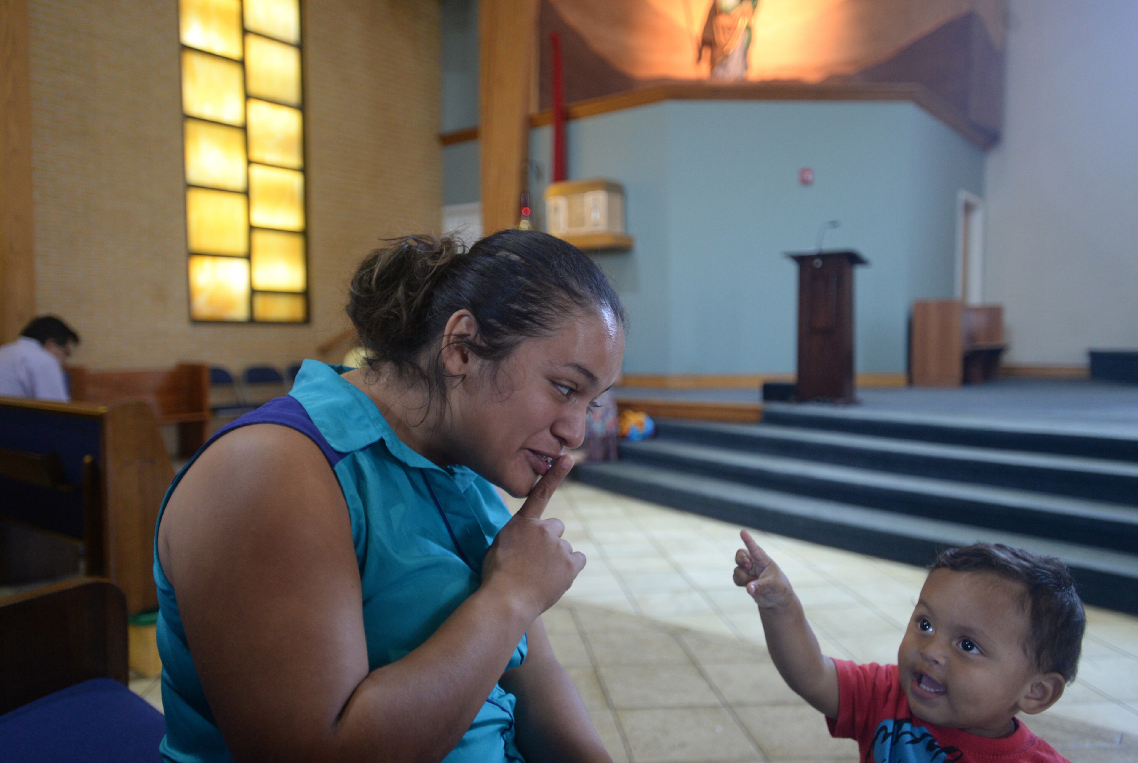 QUIET TIME--AUGUST 2, 2015 LILBURN Claudia Mariela Jurado is shown in the sanctuary of Our Lady of the Americas Catholic Mission in Lilburn Sunday, August 2, 2015. Jurado, a pregnant El Salvadorian woman who has been ordered deported for illegally entering the U.S., has fled to an Atlanta-area Catholic mission, where she is seeking sanctuary with her two young children. Jurado recently cut off the electronic monitoring bracelet immigration authorities had attached to her ankle. She absconded after she was asked to report to them Friday for her removal. Now living in a converted office at Our Lady of the Americas Catholic Mission in Lilburn, Jurado said she left El Salvador because a gang extorted money from her there. A Catholic, she said she will stay at the mission until “God decides” otherwise. “I’m afraid for my life,” she said through an interpreter Sunday about the possibility of returning to her native country. KENT D. JOHNSON /KDJOHNSON@AJC.COM